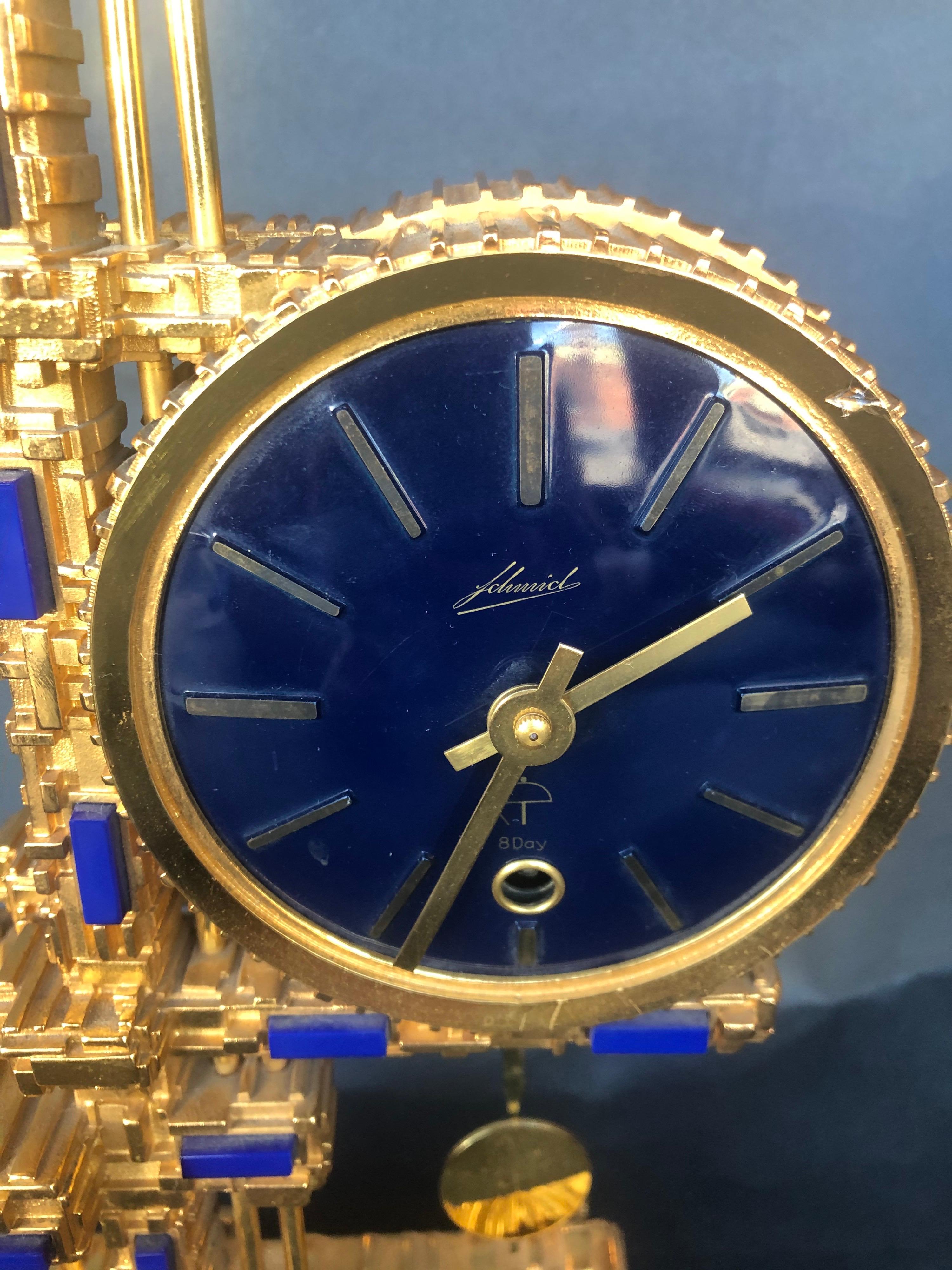 Reloj de bronce chapado en oro con piedras azules Alemán en venta