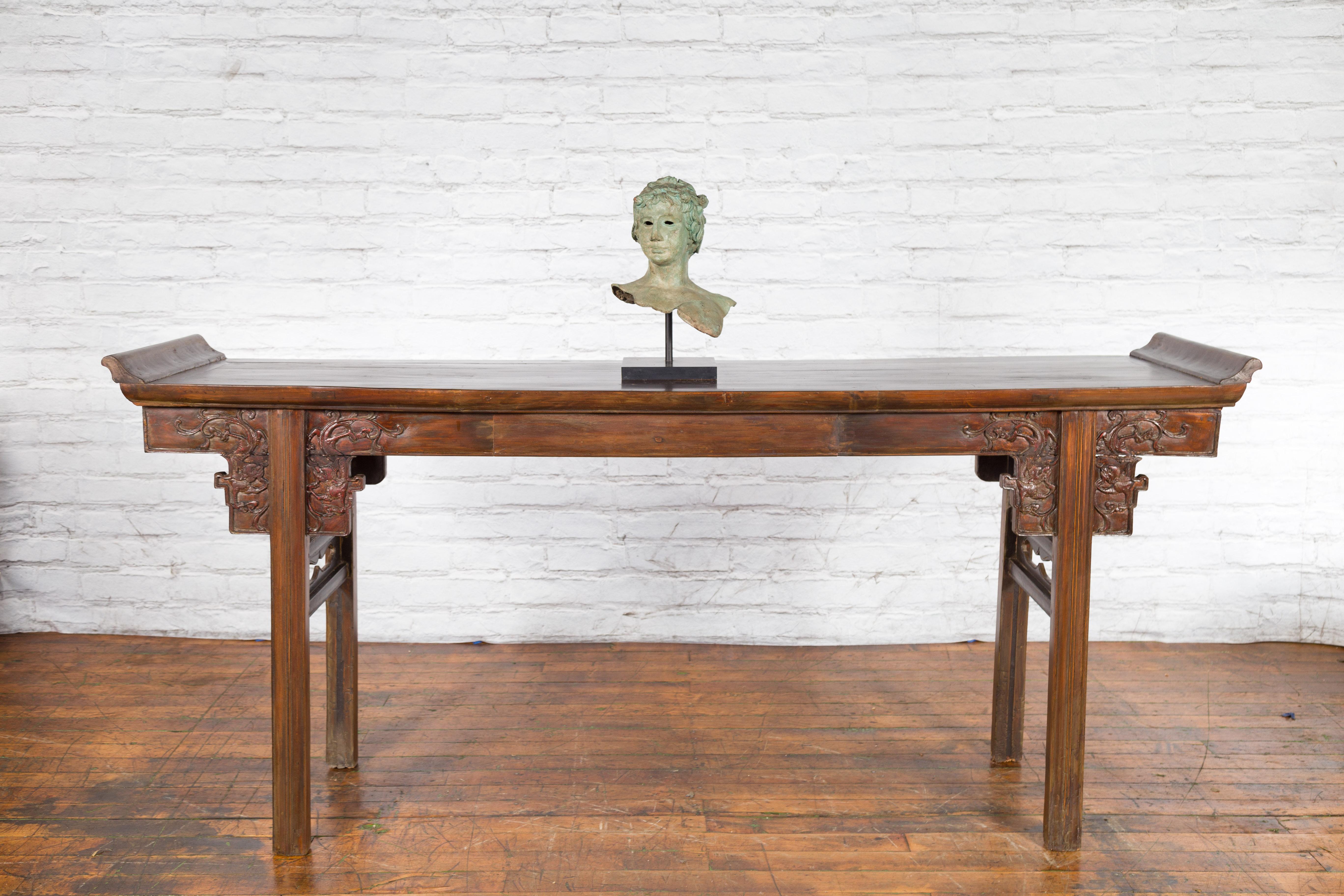 A vintage cast bronze Greco-Roman style bust from the mid 20th century, with custom stand. Created with the traditional technique of the lost-wax (à la cire perdue) which allows for great precision and finesse in the details, this bronze sculpture