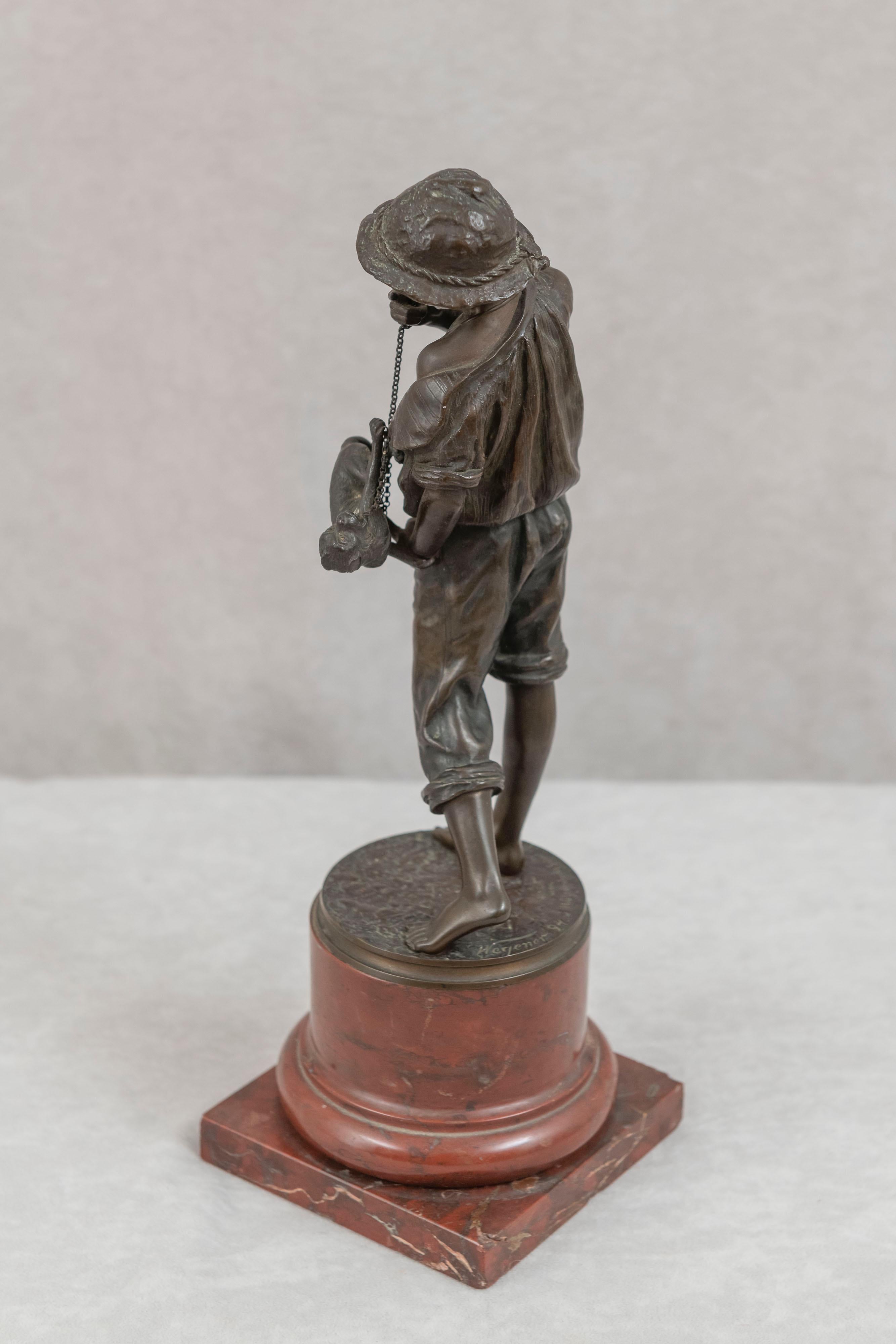 Belle Époque Groupe en bronze, Jeune garçon et son singe de compagnie formé, Allemagne, daté de 1894 en vente