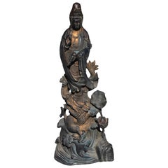 Bronzestatue von Guan Yin auf Drachenstatue