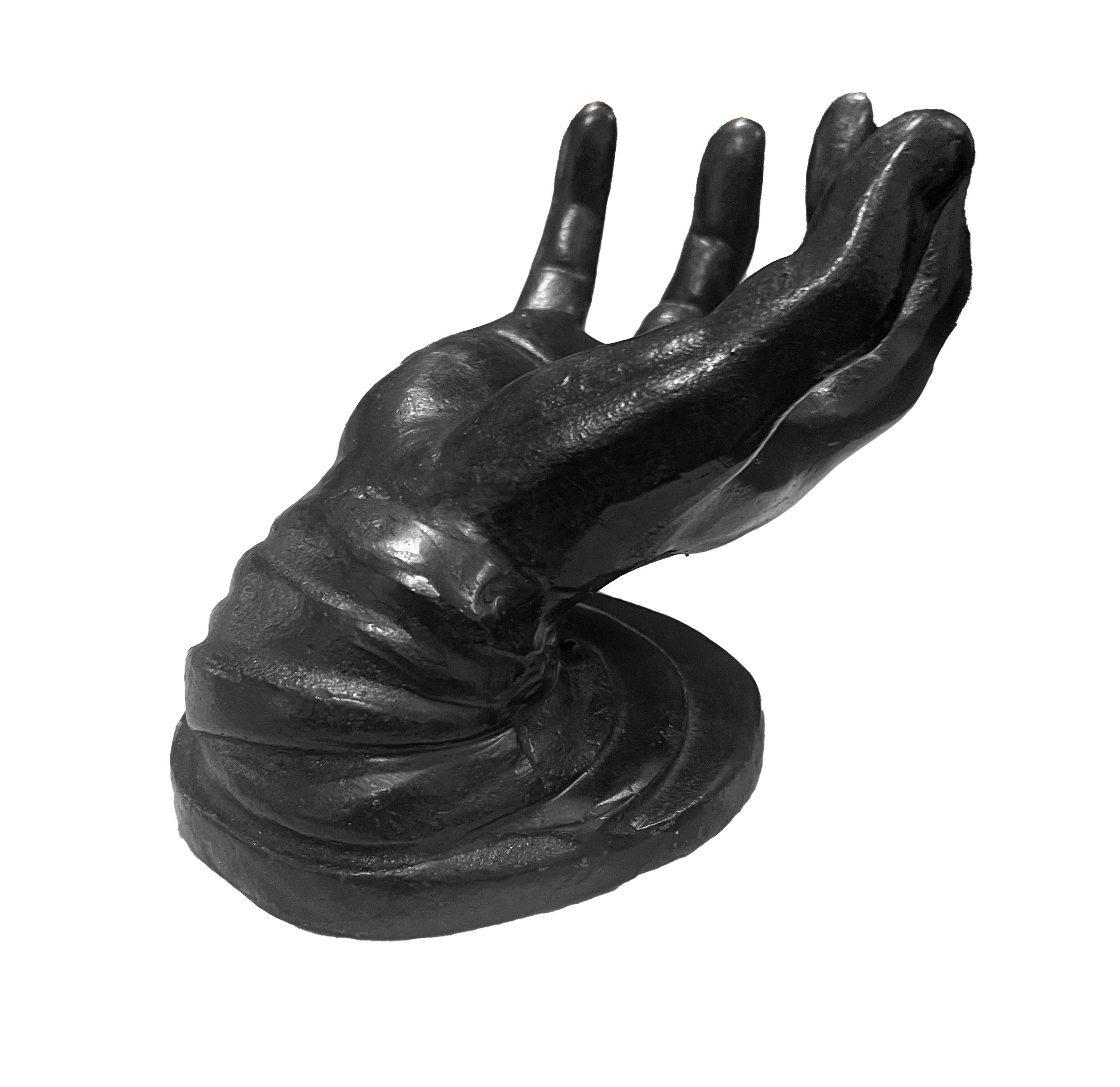 This captivating bronze hand sculpture is an epitome of craftsmanship and meticulous attention to detail. Cast from solid bronze, this piece is not just a sculpture but a statement of artistry, with each line and curve meticulously shaped to capture