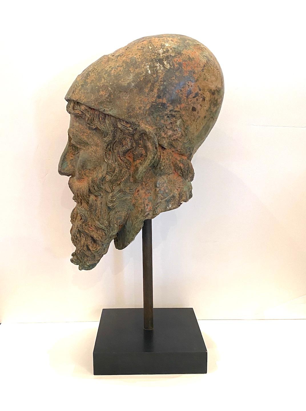 A mounted, cast bronze head of soldier in the Grand Tour style.
