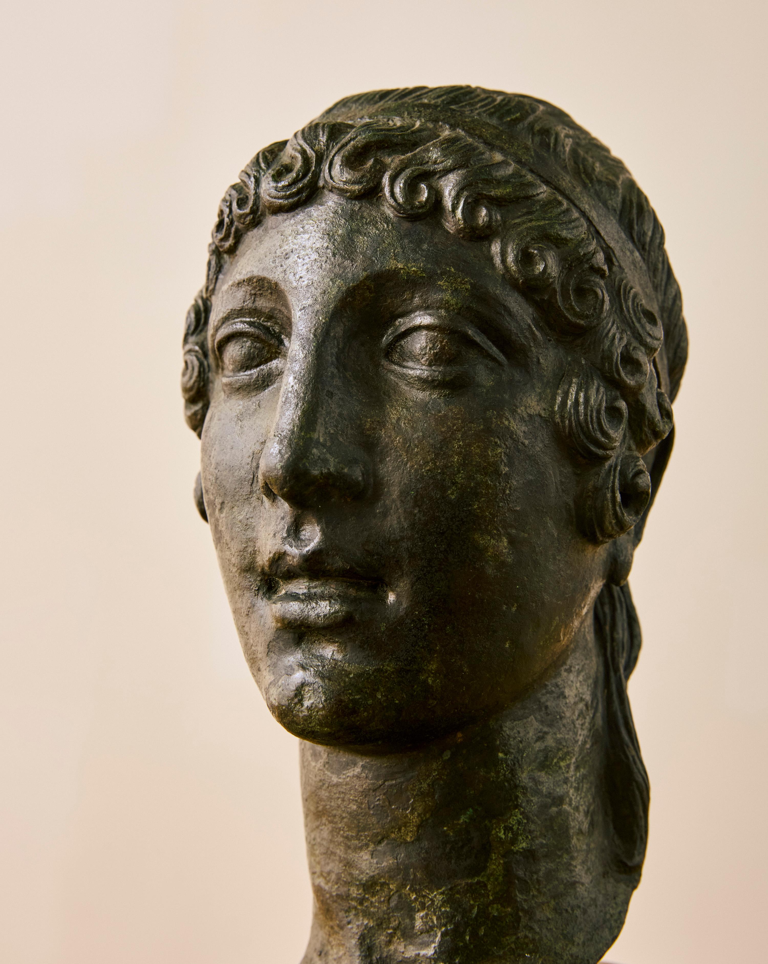 19th Century grand tour bronze head figure on rounded Siena marble base.