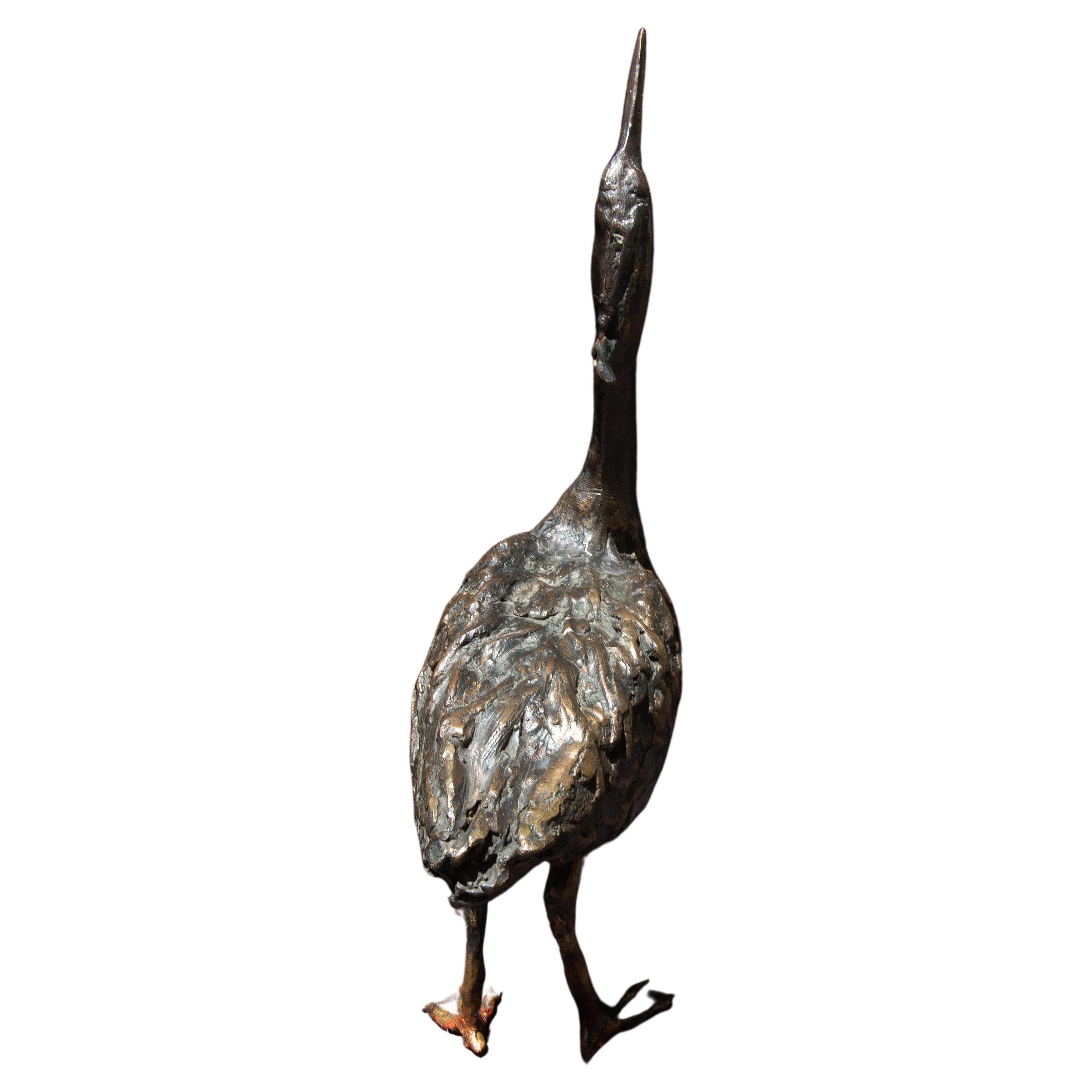 Airone in bronzo dello scultore americano Wayne Williams. Firmato e datato 1993. Edizione 2/2. Montato su una base in noce. 
Dalla rivista Finger Lakes Magazine 2001:

L'arte è ovunque nei Finger Lake. Ispirati dai diversi paesaggi e stili di vita