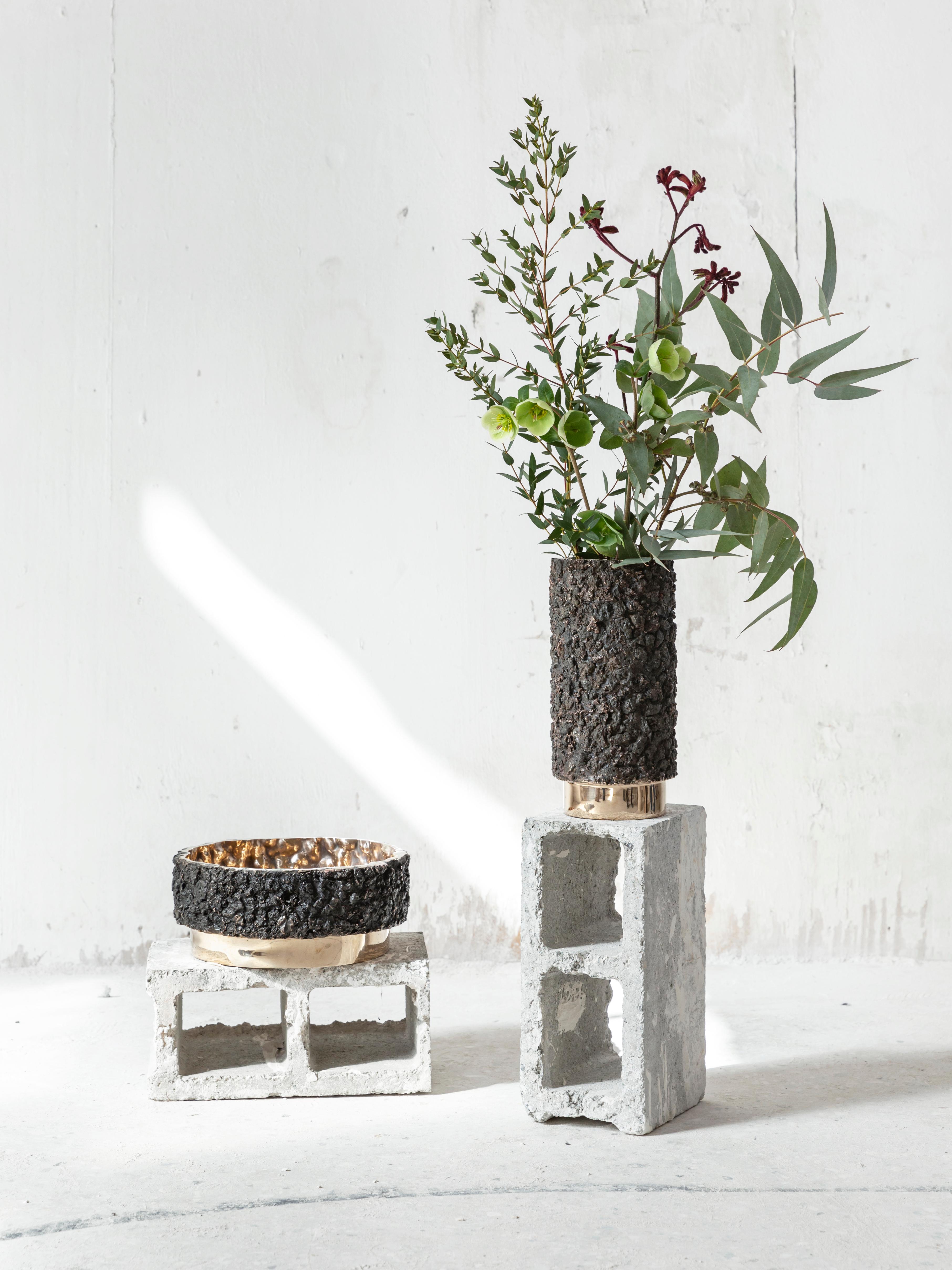 Bronze high vase by Tipstudio
Numbered Edition
Dimensions: Ø 15 x 30 cm
Materials: Slags, Statuario Bronze
Weight: 10 kg 

Tipstudio, Imma Matera and Tommaso Lucarini, has chosen to focus on metals byproduct aims to enhancing them by