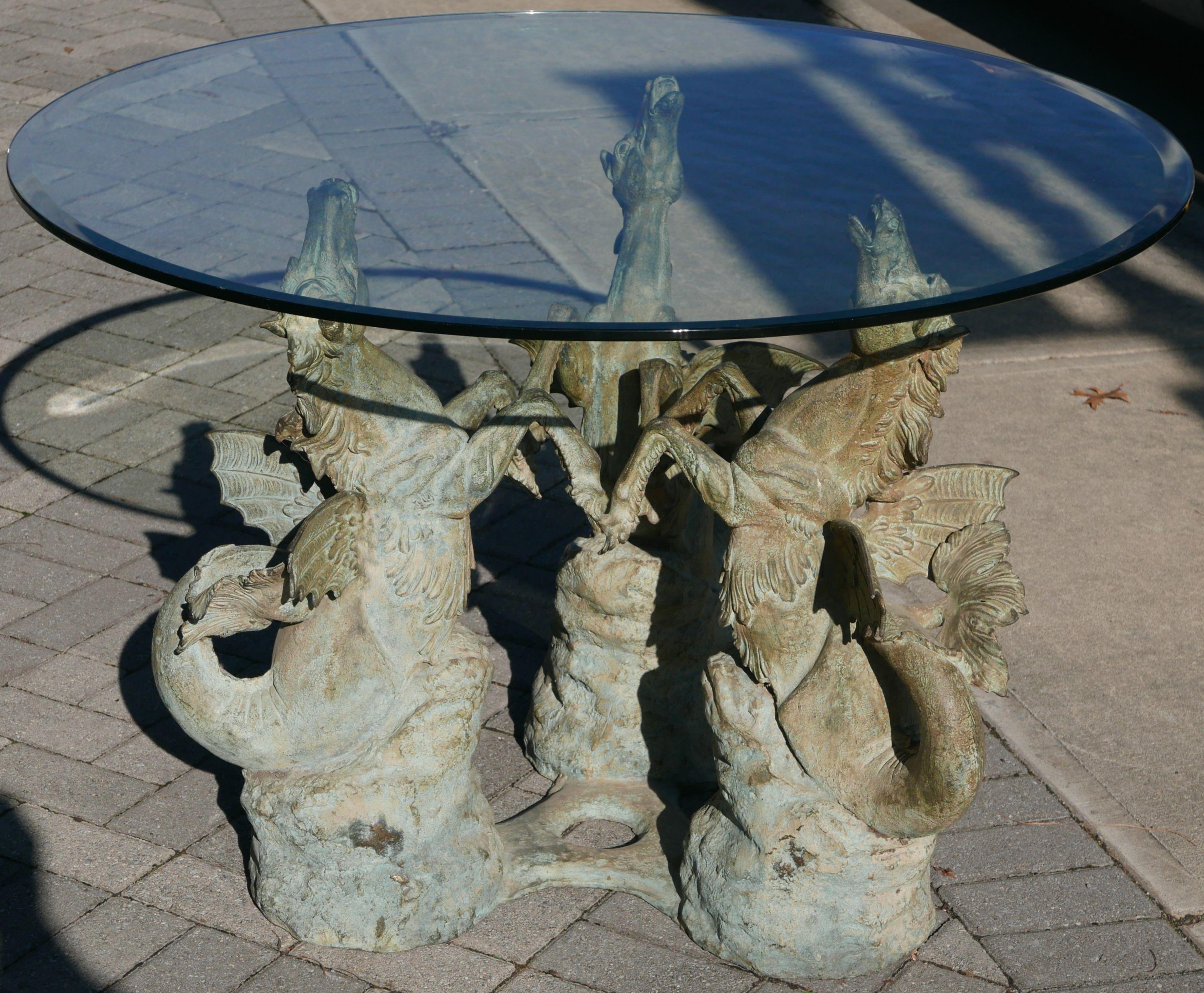 Neoclassical bronze hippocampus or seahorse table with wonderful verdigris patina supporting a glass top, circa 1970.