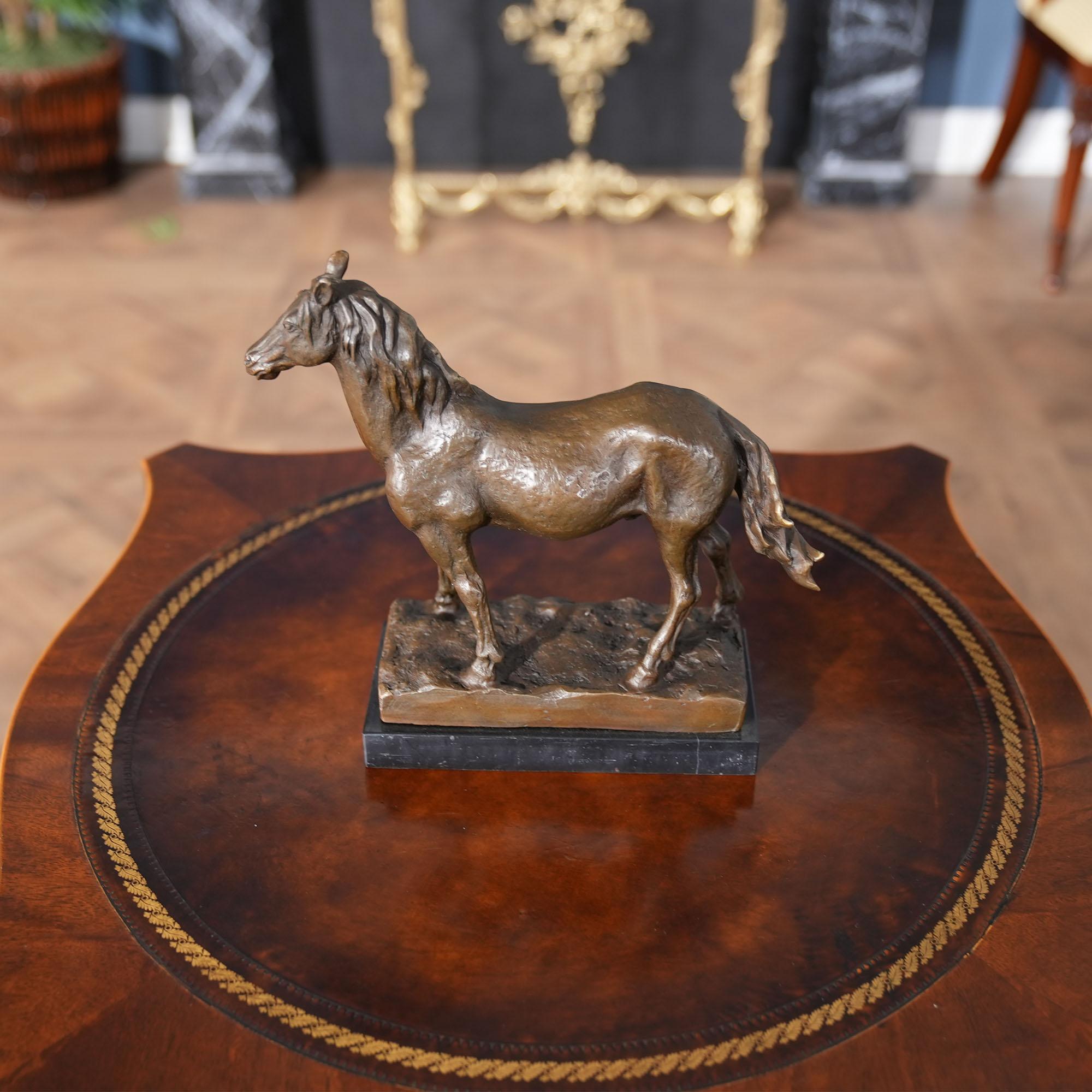 Graceful even when standing still the Bronze Horse on Marble Base is a striking addition to any setting. Using traditional lost wax casting methods the horse is created in pieces and then joined together with brazing and hand chaised details are