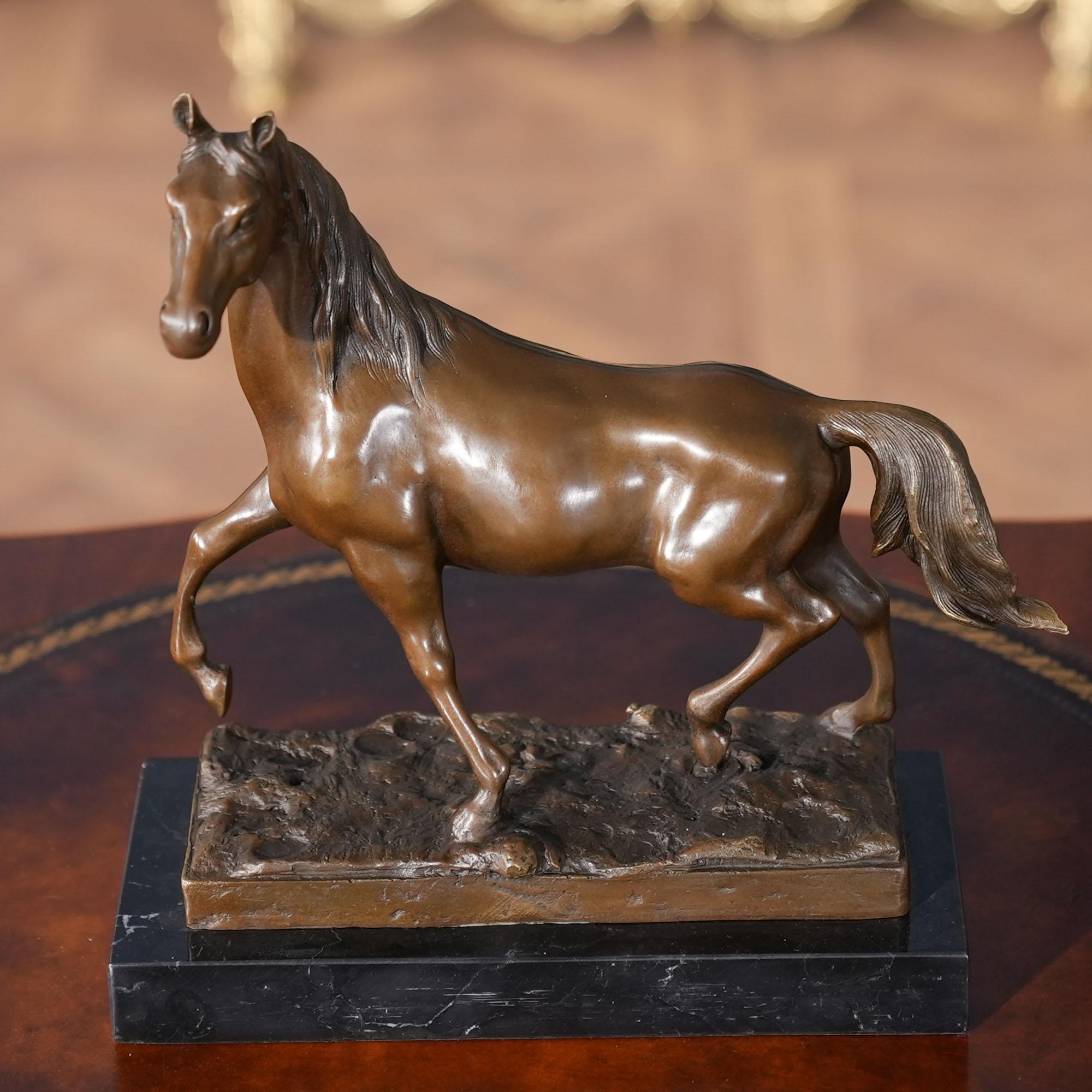 Graceful even when standing still the Bronze Horse on Marble Base is a striking addition to any setting. Using traditional lost wax casting methods the horse is created in pieces and then joined together with brazing and hand chaised details are