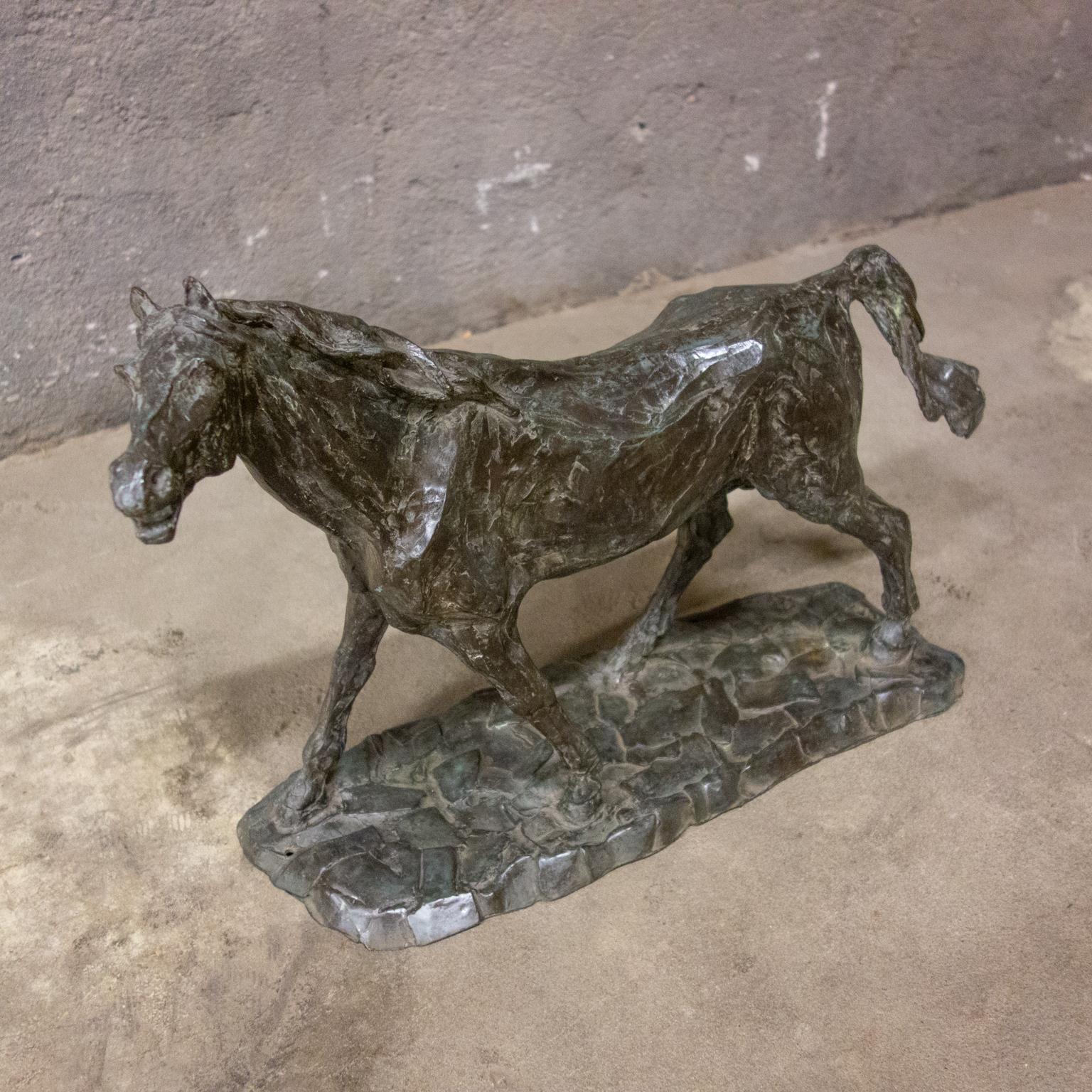 Very energetic horse sculpture made by Hans Balner. Balner made sculptures after his retirement in the 1990s.