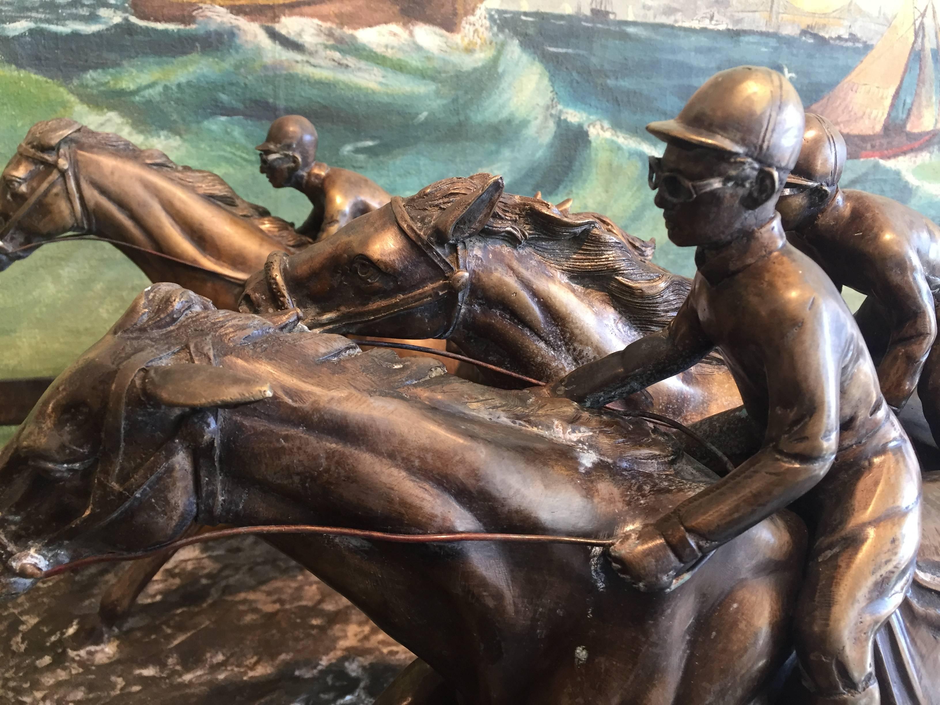 Mid-20th Century Bronze Horses in a Race with Jockeys For Sale