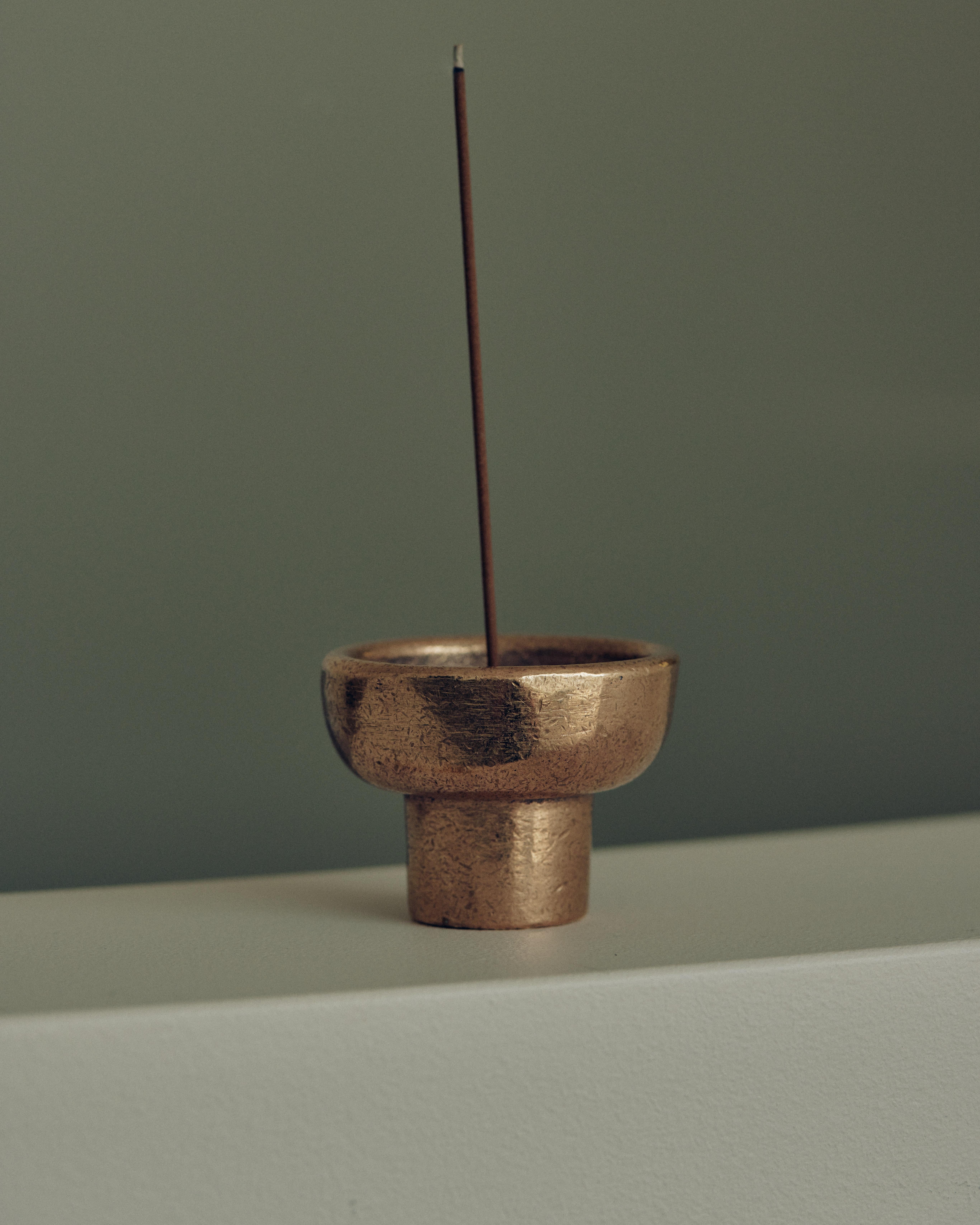 Bronze Incense Burner by Henry Wilson
Dimensions: D 6 x H 5 cm
Materials: Bronze

The Incense Burner was initially designed for Perfumer H. The piece is sand cast in solid Bronze and hand finished. 

The incense ash is collected in the base of the