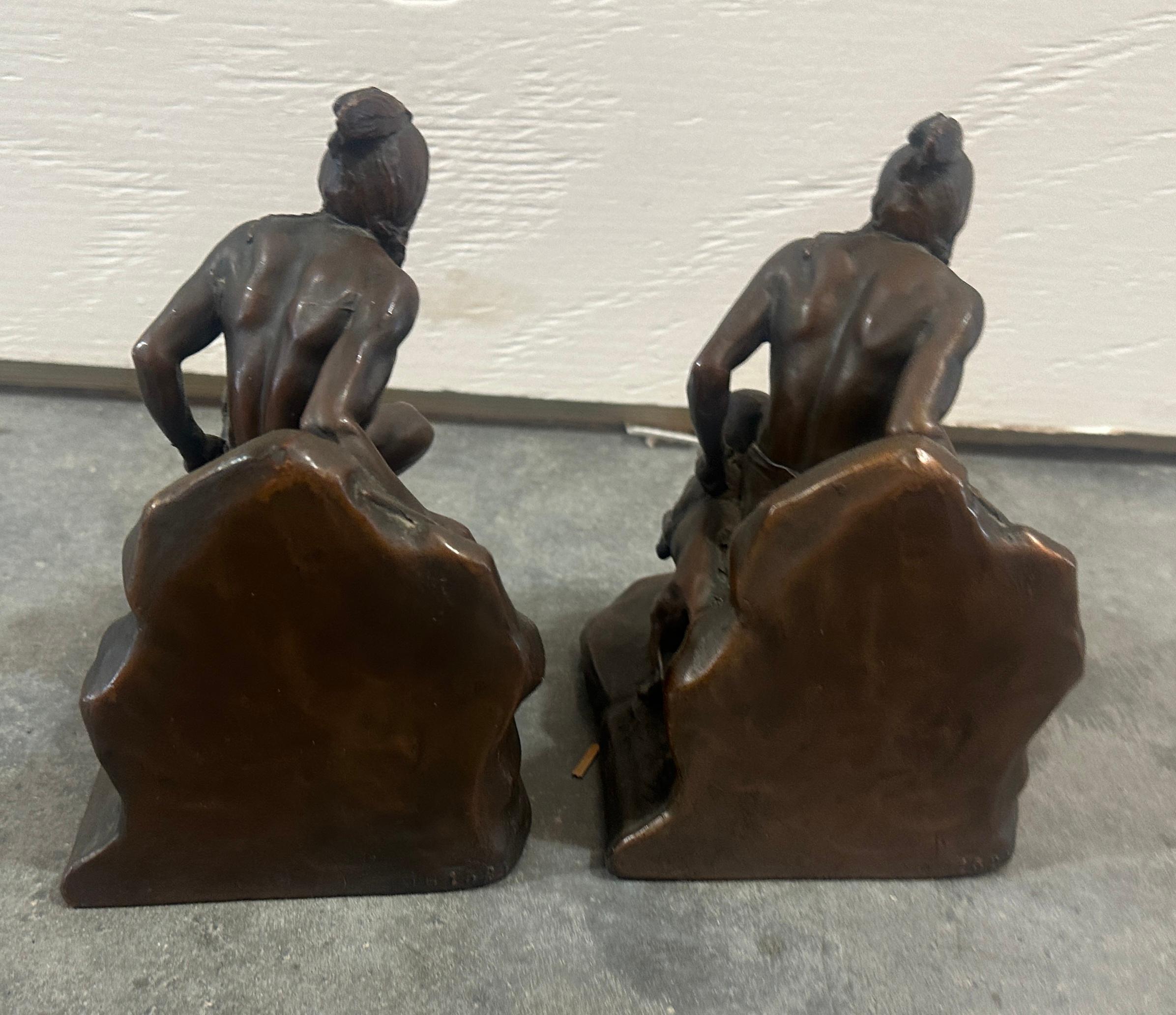 This pair of bronze bookends of an Indian & his dog are signed JB1524-C.Vieth.
Fine condition.