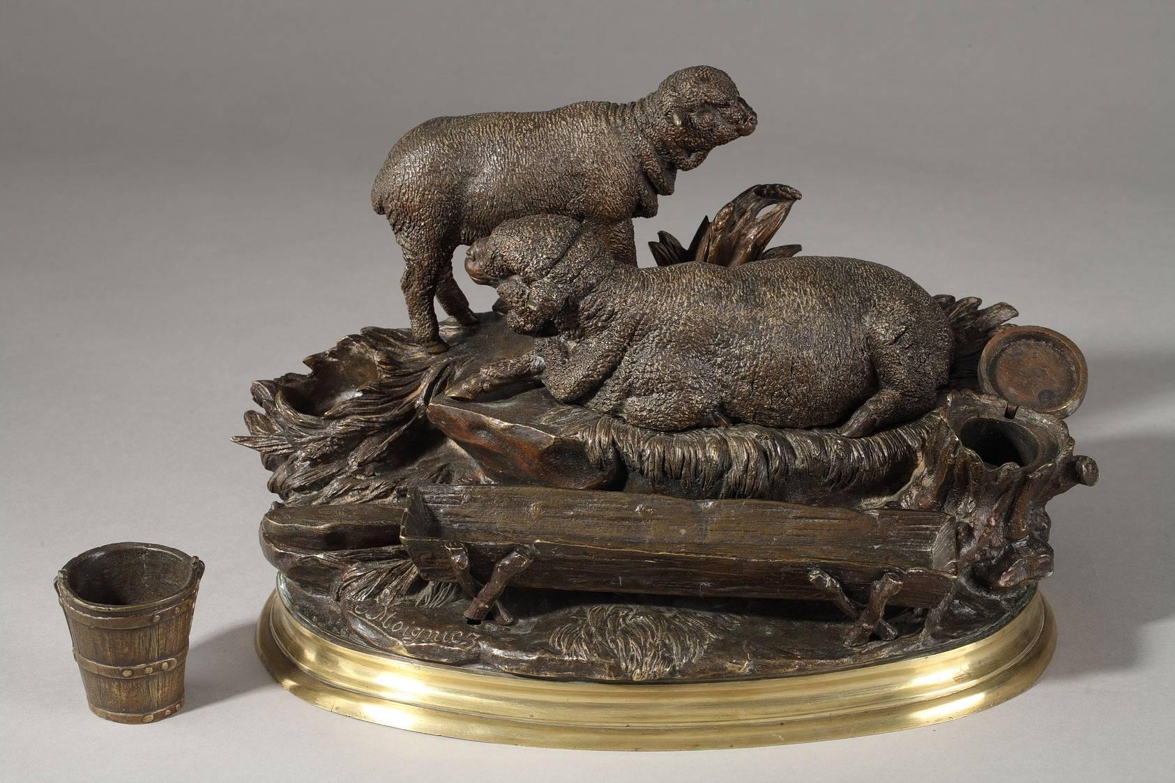 Bronze inkwell sculpture with nuanced brown patination. Two ink pots are cleverly hidden at either end of the sculpture: One in the stump of the tree and the other under a rock. Moigniez' intricate work on the surface of the piece created a