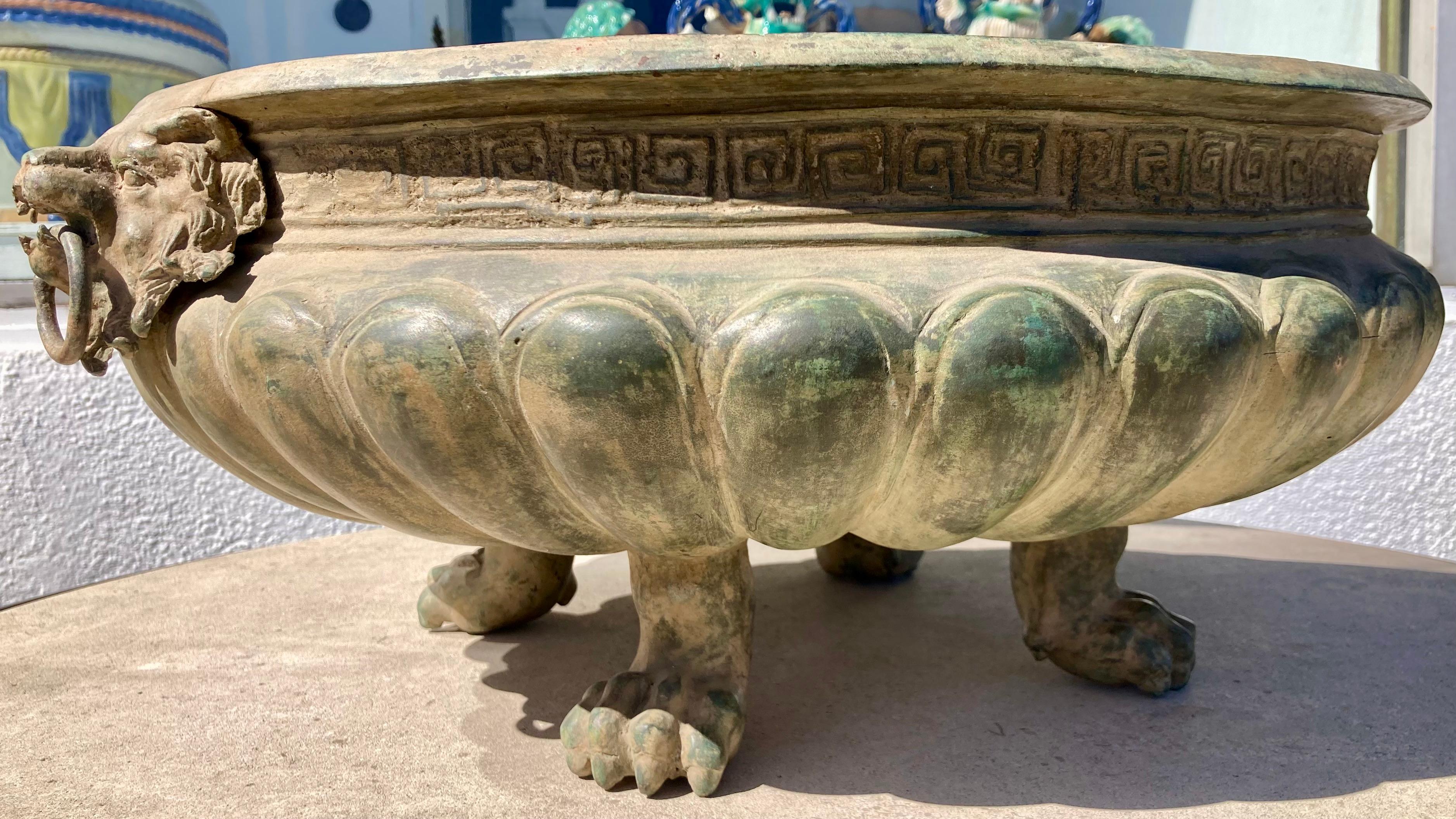 Beautiful bronze Italian classical lion paw footed planter. Give some classical character to your interiors and outdoors. Perfect for orchids, it will hold 5 to 7 Orchids!