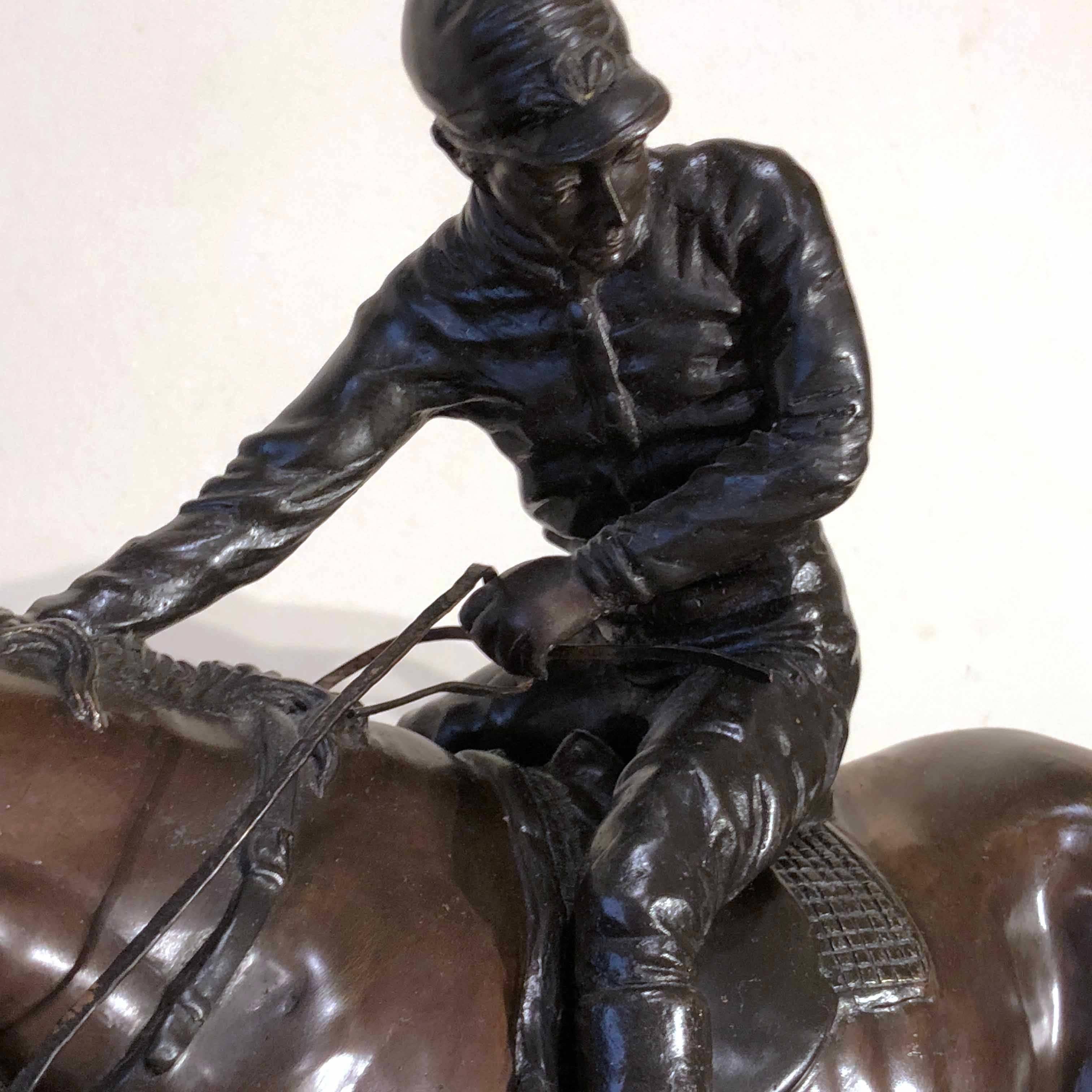 Jockey bronze sculpture attributed (with documentation) to J. Bonheur, French artist (1827-1901). Both the horse and the Jockey are represented in a very realistic way. This piece is characterized by great quality of the bronze and Fine attention to