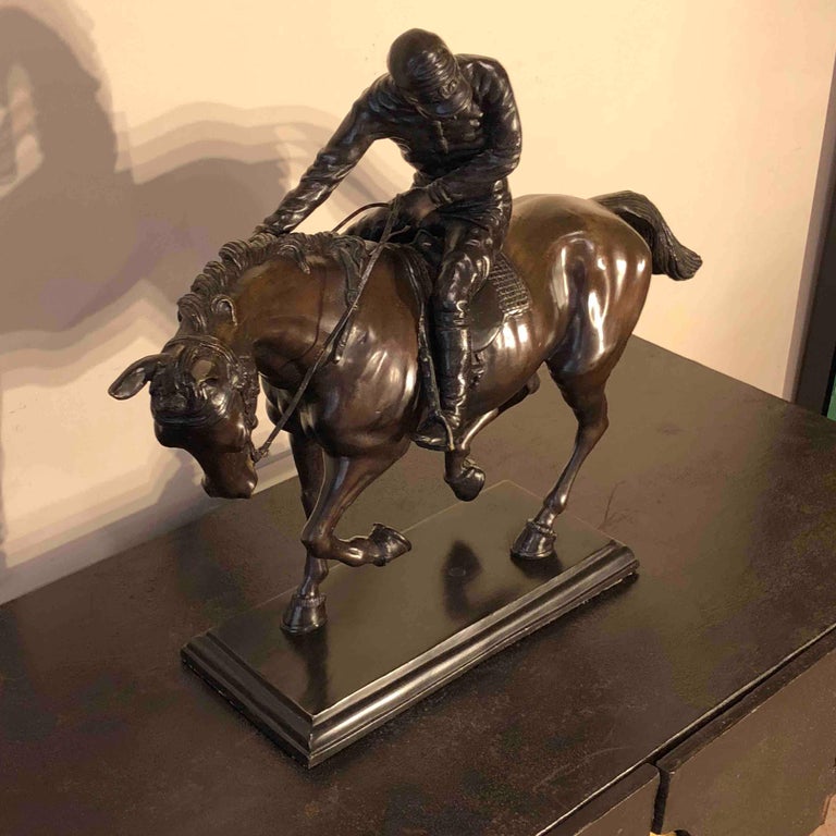 Bronze Jockey on Horse Sculpture Black marble base attributed to J