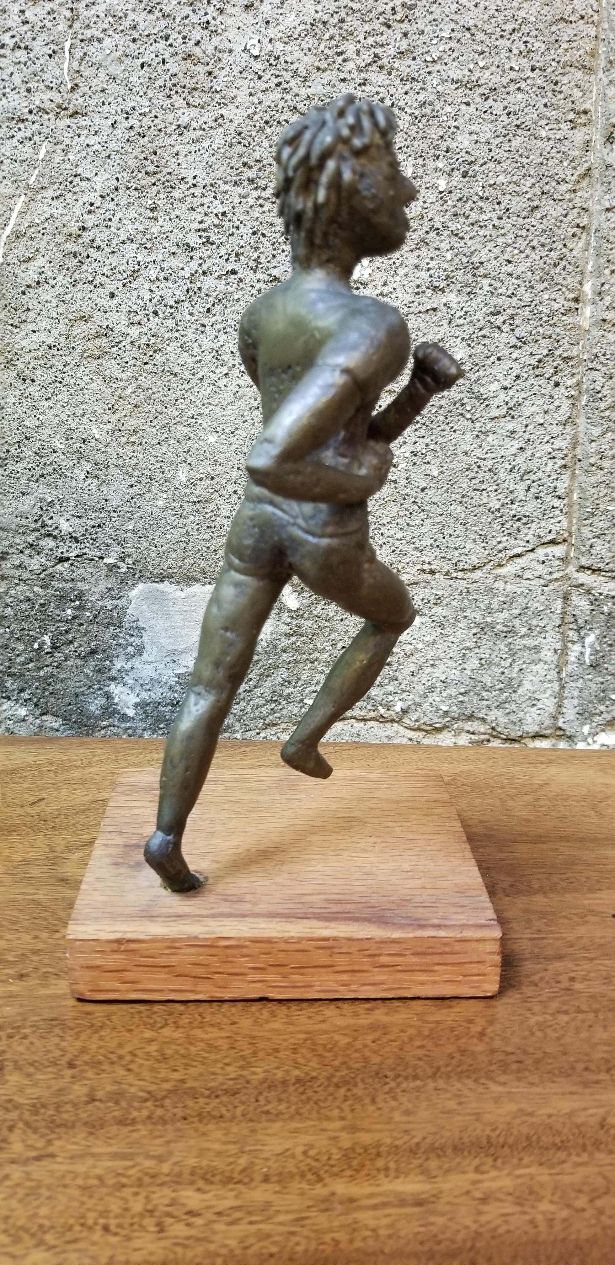 Brutalist Bronze Jogger Sculpture For Sale