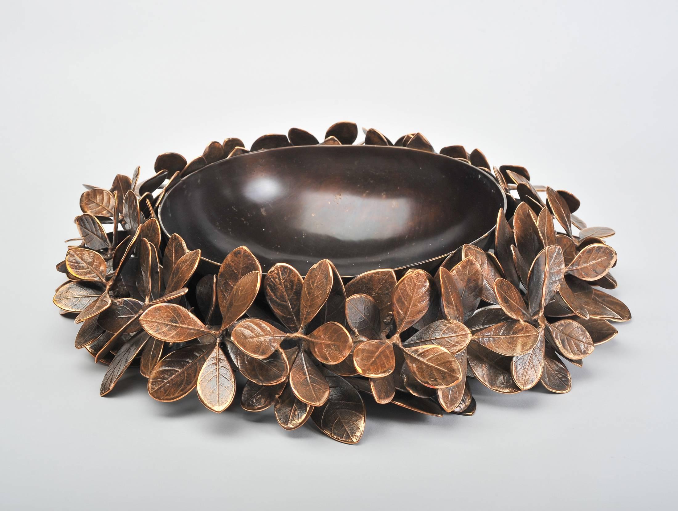 Limited edition cast bronze leaf bowl with patina finish. Each leaf is handmade and then put together, making every bowl unique.