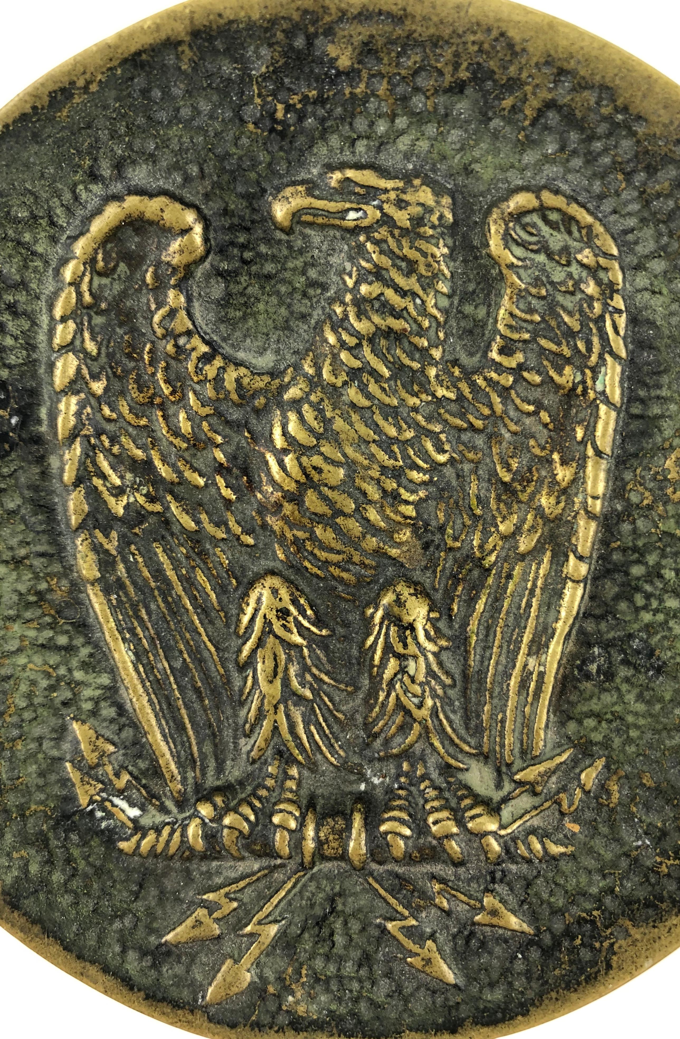 Bronze by Max Le Verrier that makes a great key holder/vide-poche. 

The Imperial Eagle motif on this heavy bronze piece is beautiful and displays very well on a desk or console near an entry. 

One of a series of bronze dishes sculpted and cast