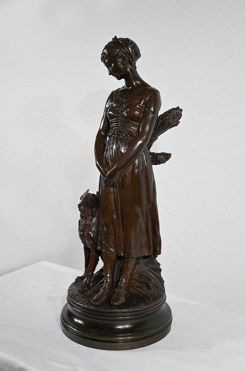 French Bronze sculpture “The Young Woman with a Dog”, signed E-L.Truffot 19th For Sale