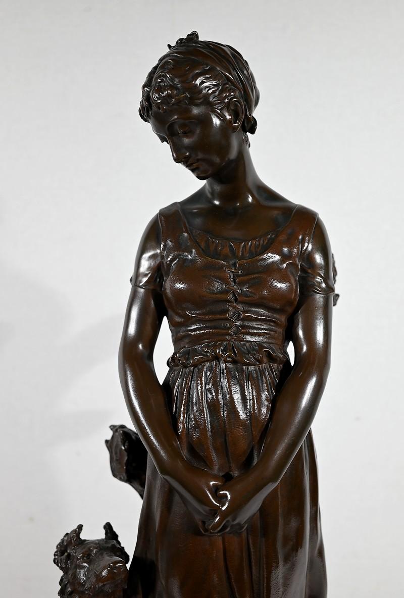 19th Century Bronze sculpture “The Young Woman with a Dog”, signed E-L.Truffot 19th For Sale