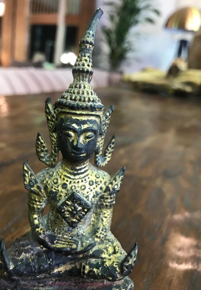 Nice little temple Buddha seated on throne in blissful meditation. Solid for its size. Listing as 20th century but could very well be 19th century. From a collection of Asian antique and vintage Buddhas. 

Dimensions: 5