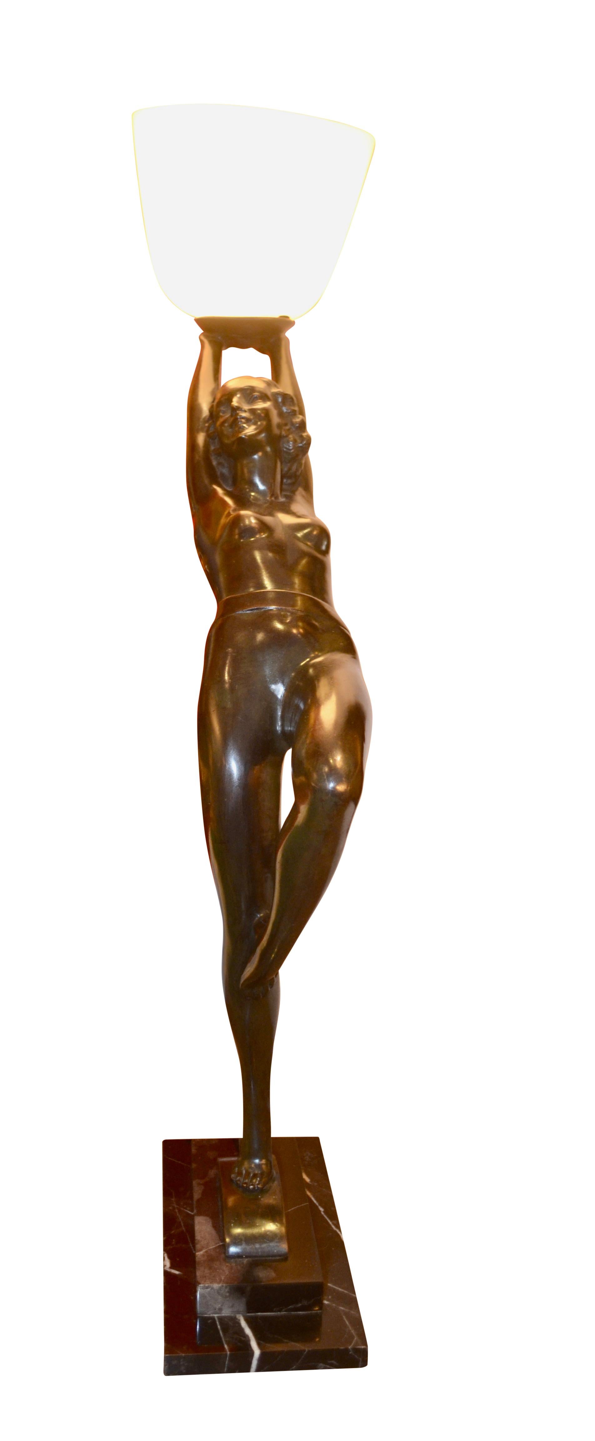 Marble    Patinated Bronze Art Deco Figurative Lamp with a Colored Glass Tulip Shade For Sale
