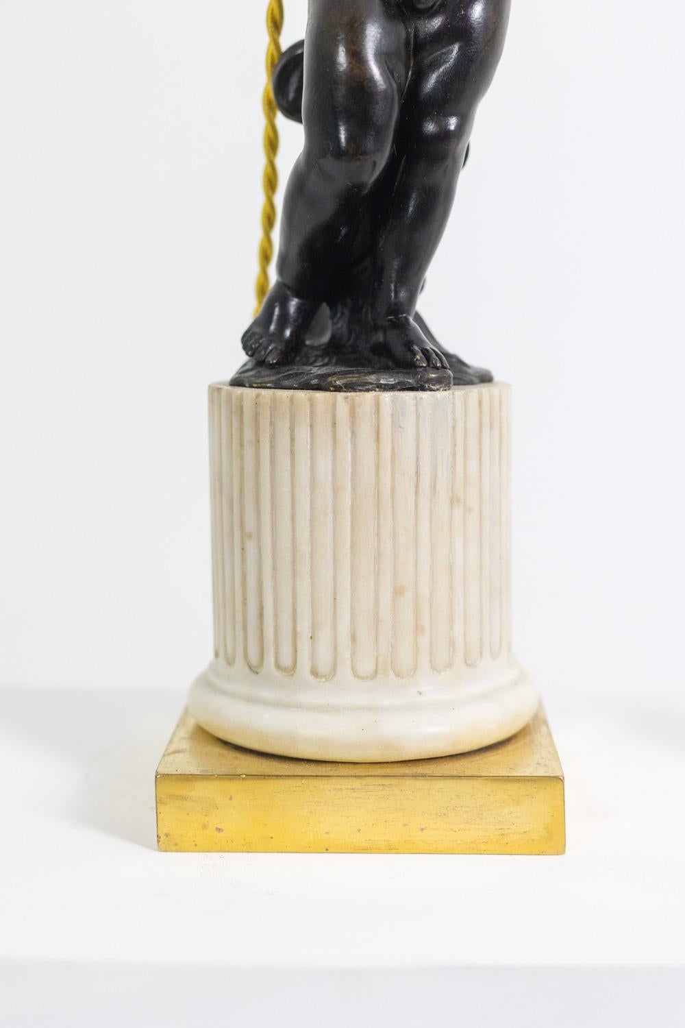 Bronze lamp representing a putti, marble base. Circa 1880. For Sale 1