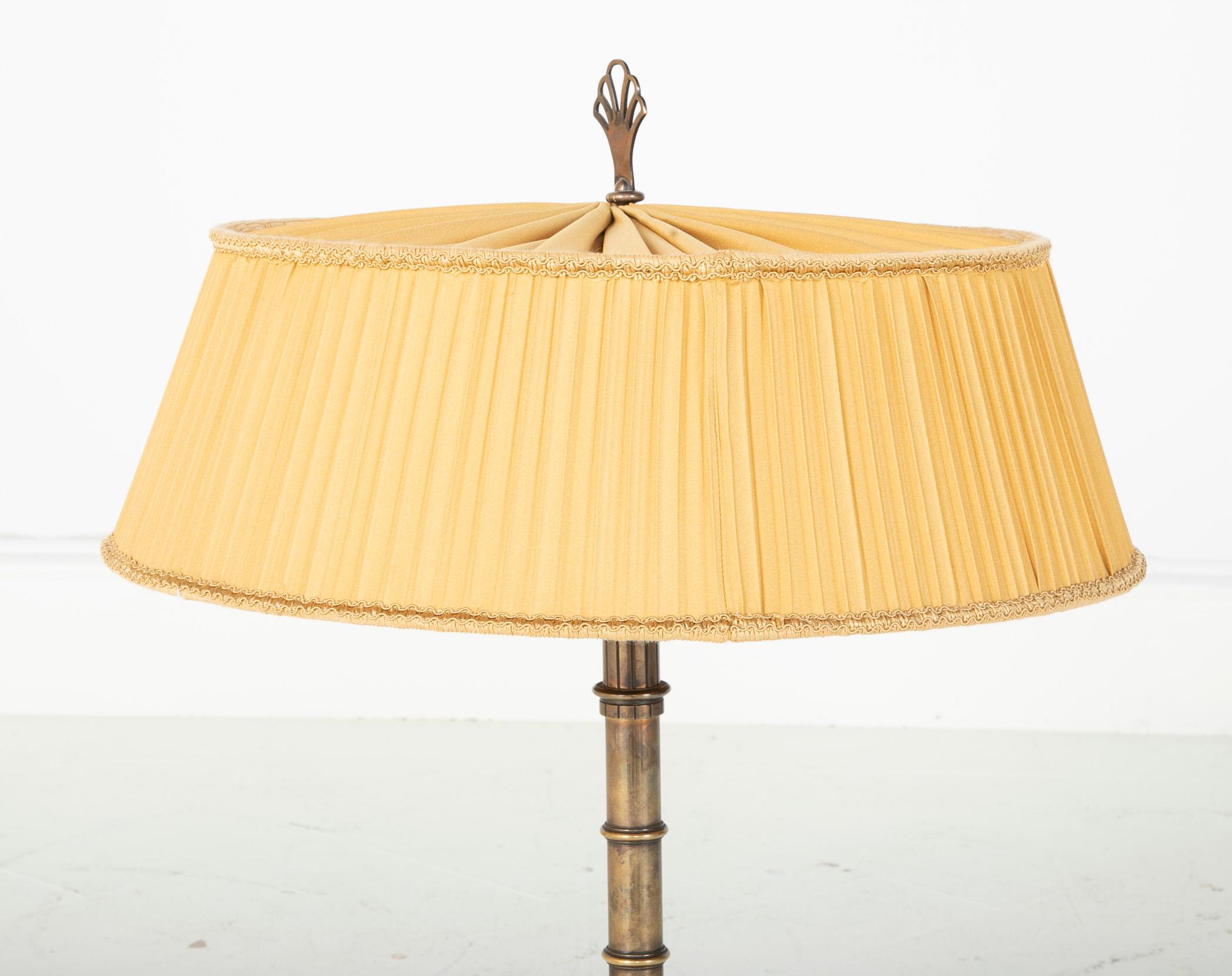 Bronze lamp with silk shade by Harald Elof Notini (1879-1959) for Bohlmarks with original silk shade and original finial.