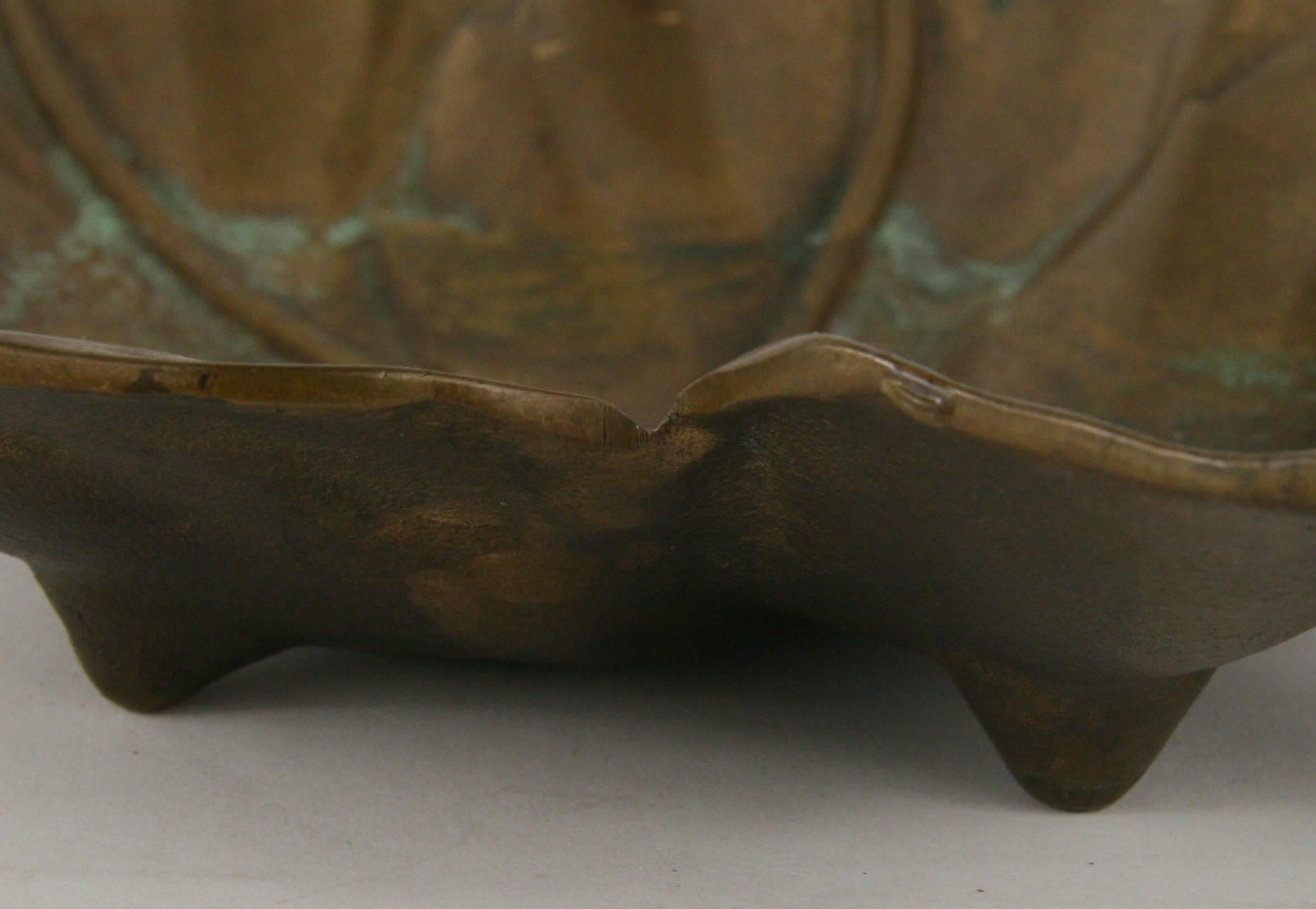 9-217, antique hand cast solid bronze leaf catchall /sculpture /garden birdbath with large handle. Oxidation to bronze.