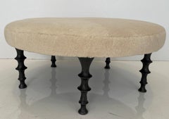 Bronze Legged ottoman with shearling Cushion