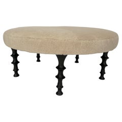 Bronze Legged ottoman with shearling Cushion