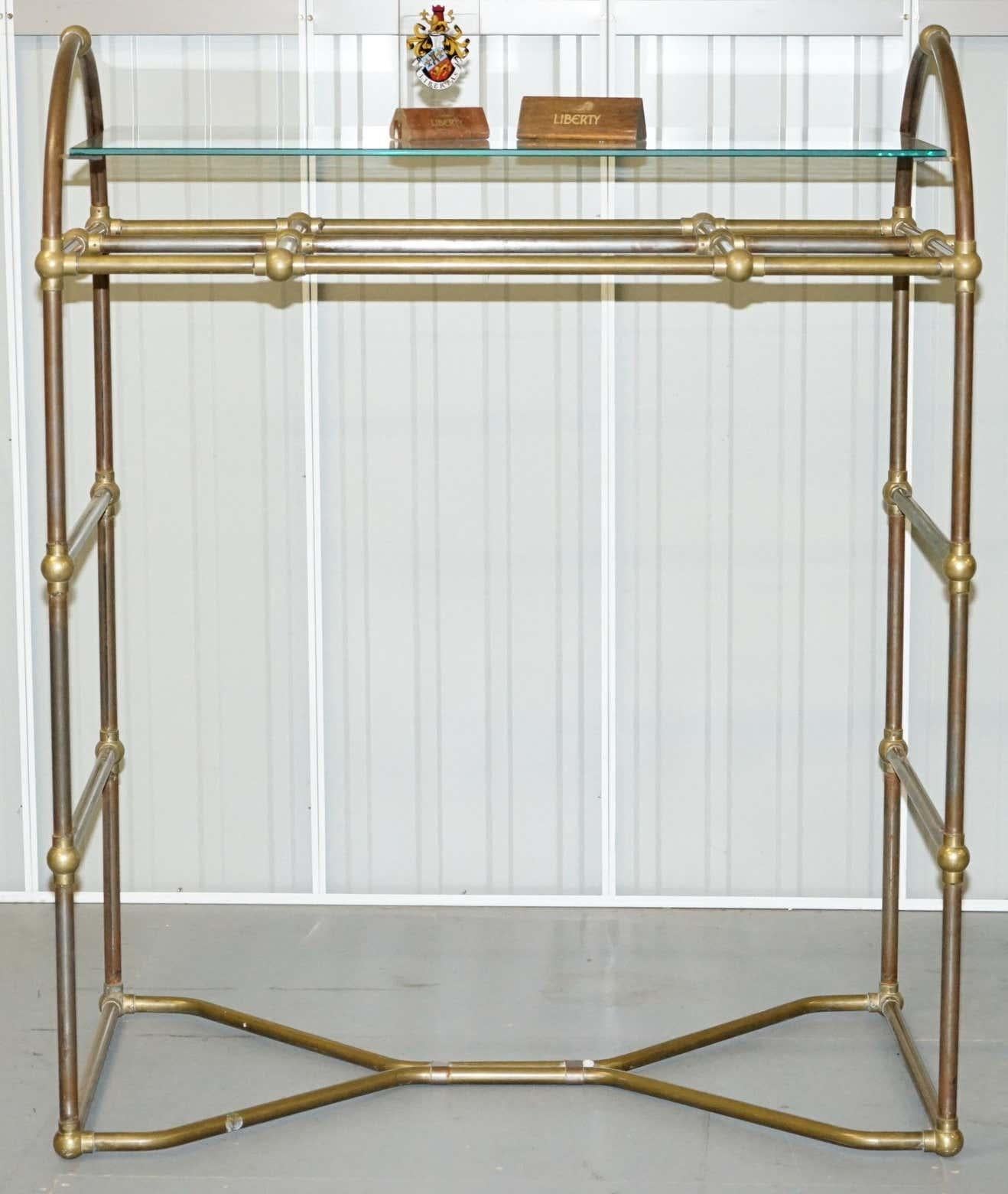 We are delighted to offer for sale this exceedingly rare original 1930’s Art Deco Bronze and Steel Liberty’s of London display rack with extending clothes rails which are part of a larger suite

This suite is as rare as they come in the world of