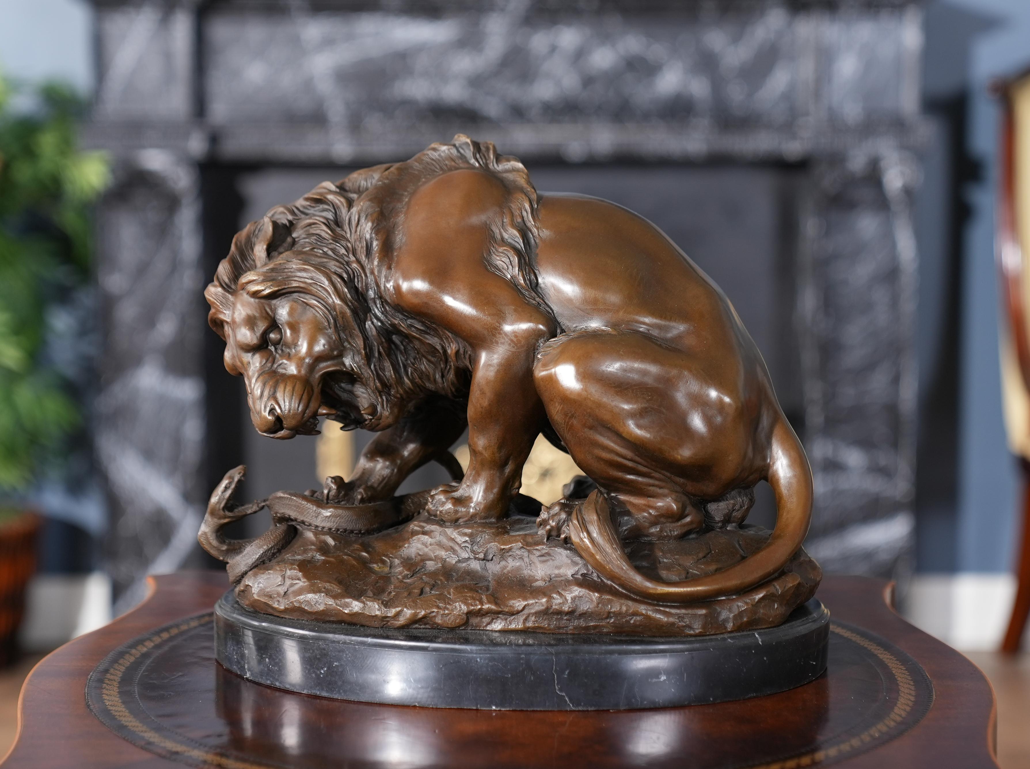 Graceful even when standing still the Bronze Lion and Snake on Marble Base is a striking addition to any setting. Using traditional lost wax casting methods the Bronze lion and Snake statue is created in pieces and then joined together with brazing