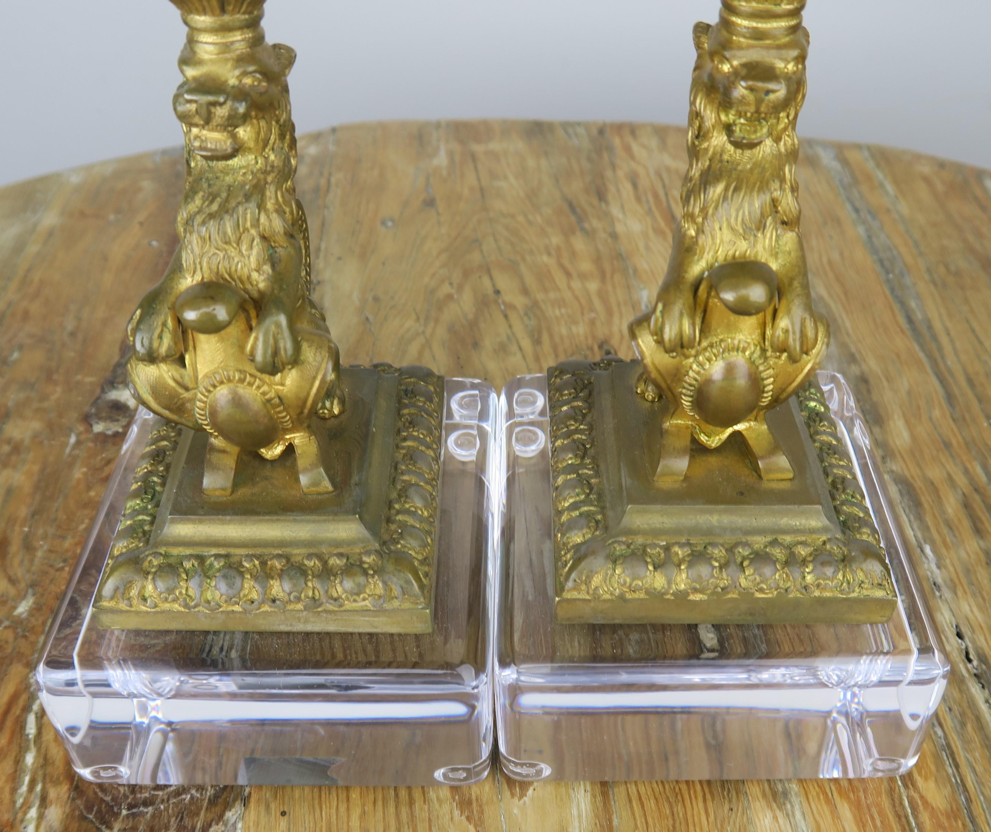 Bronze Lion Candleholders on Lucite Bases, Pair In Good Condition In Los Angeles, CA