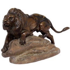 Bronze Lion on a Rock