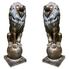 Estatuas de león de bronce