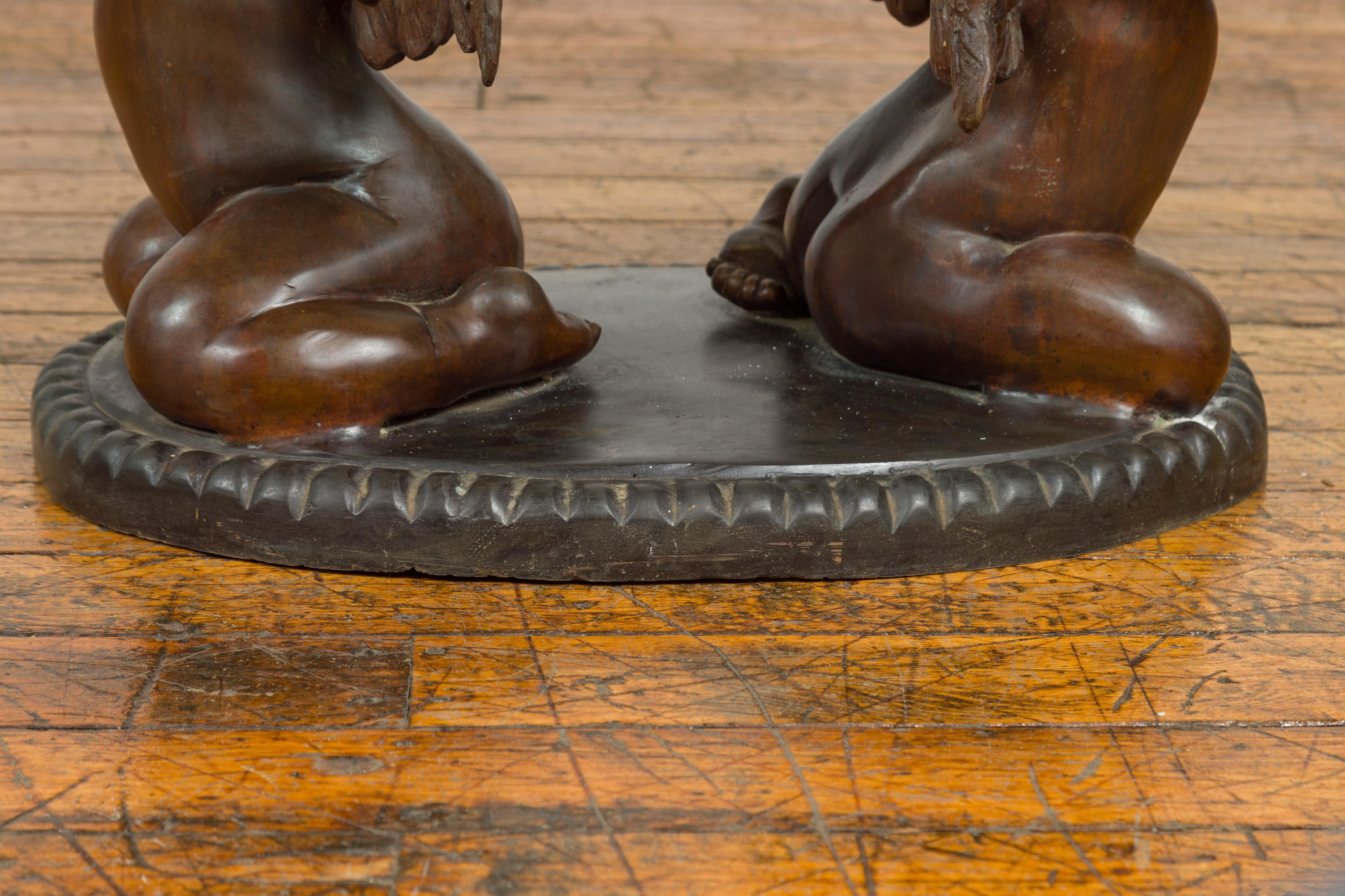 Bronze Looking to the Heavens Double Cherub Coffee Table Base with Dark Patina In Good Condition For Sale In Yonkers, NY