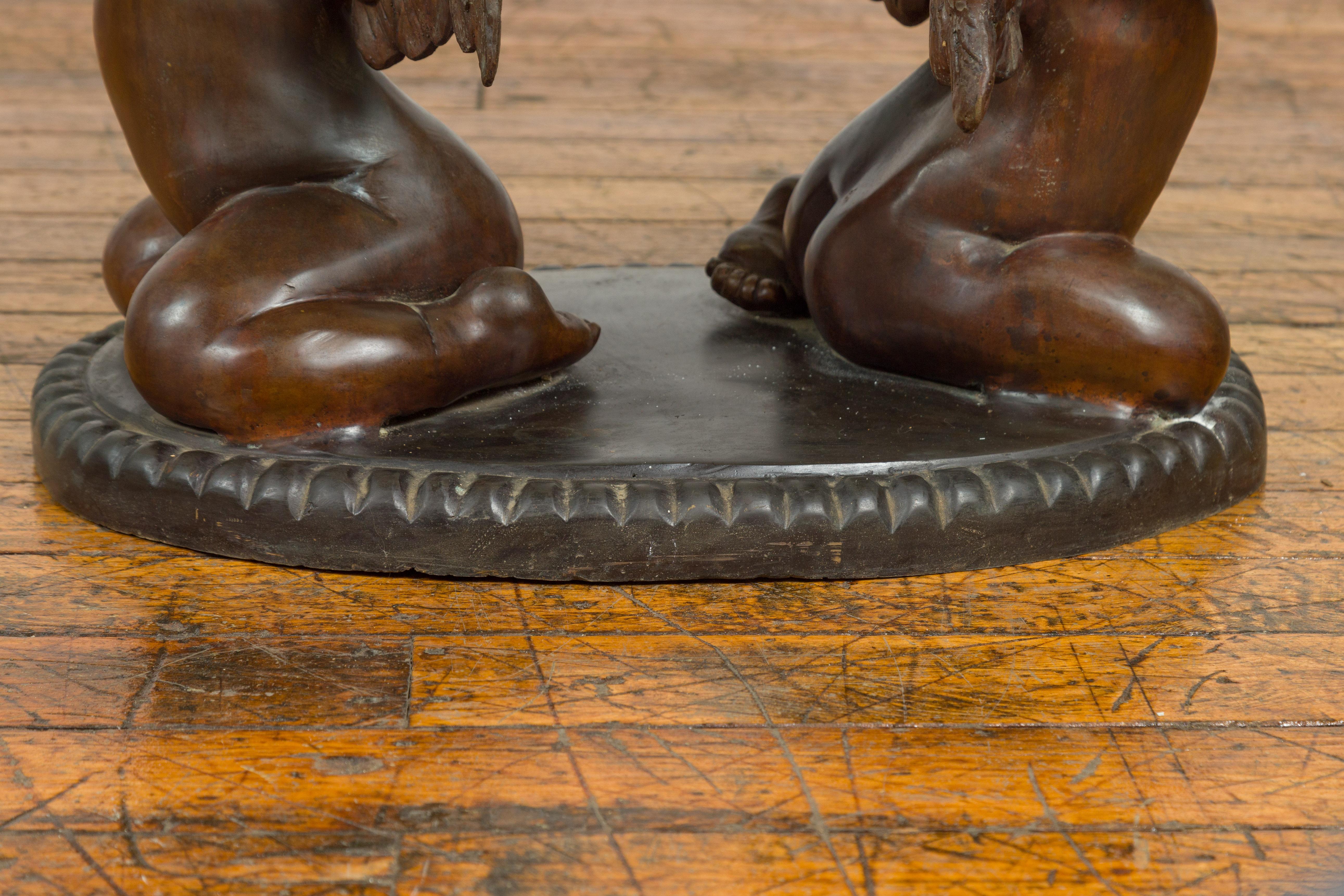 Bronze Looking to the Heavens Double Cherub Coffee Table Base with Dark Patina In Good Condition In Yonkers, NY