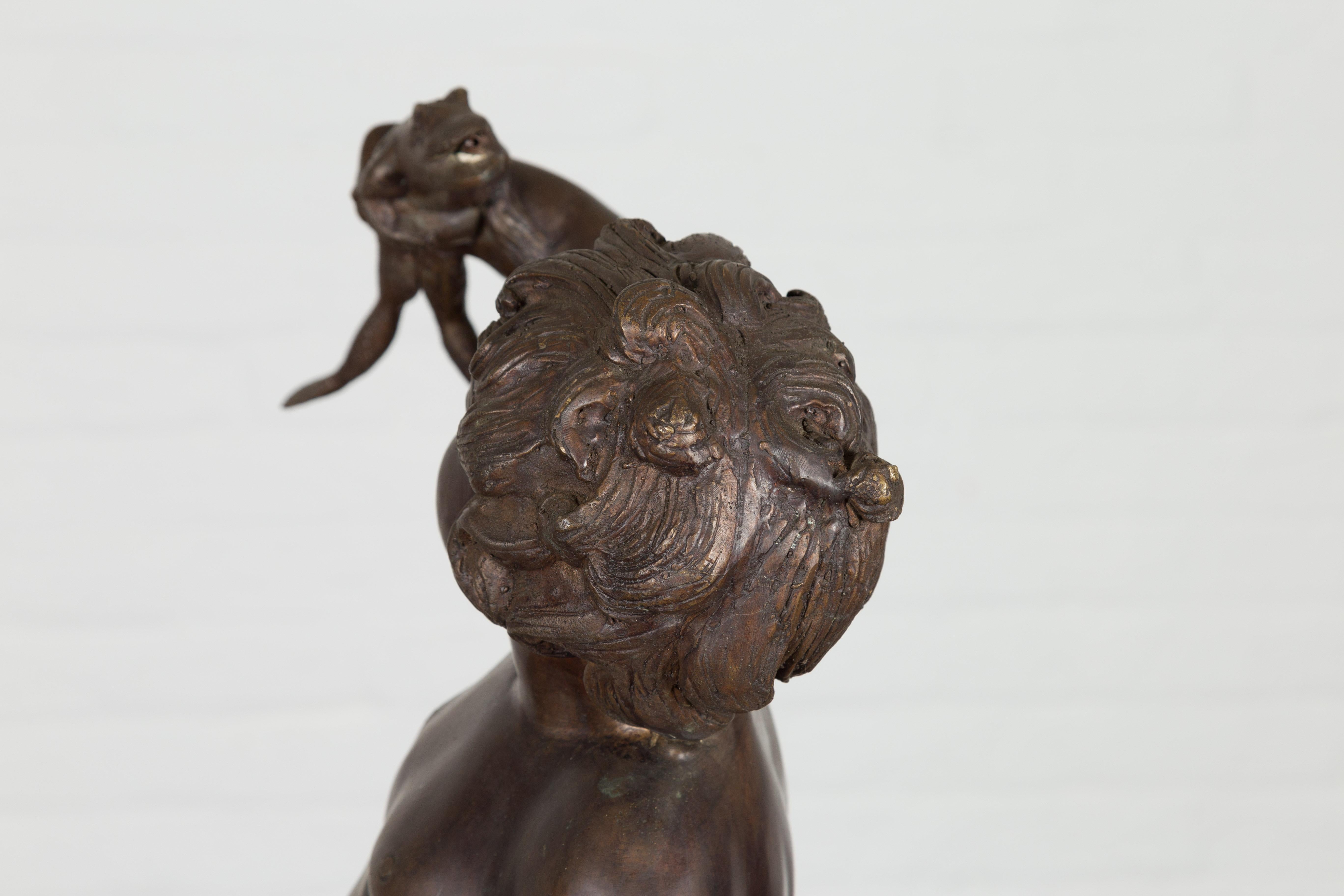 Classical Bronze Tabletop Statue of a Putto Holding a Frog For Sale 9