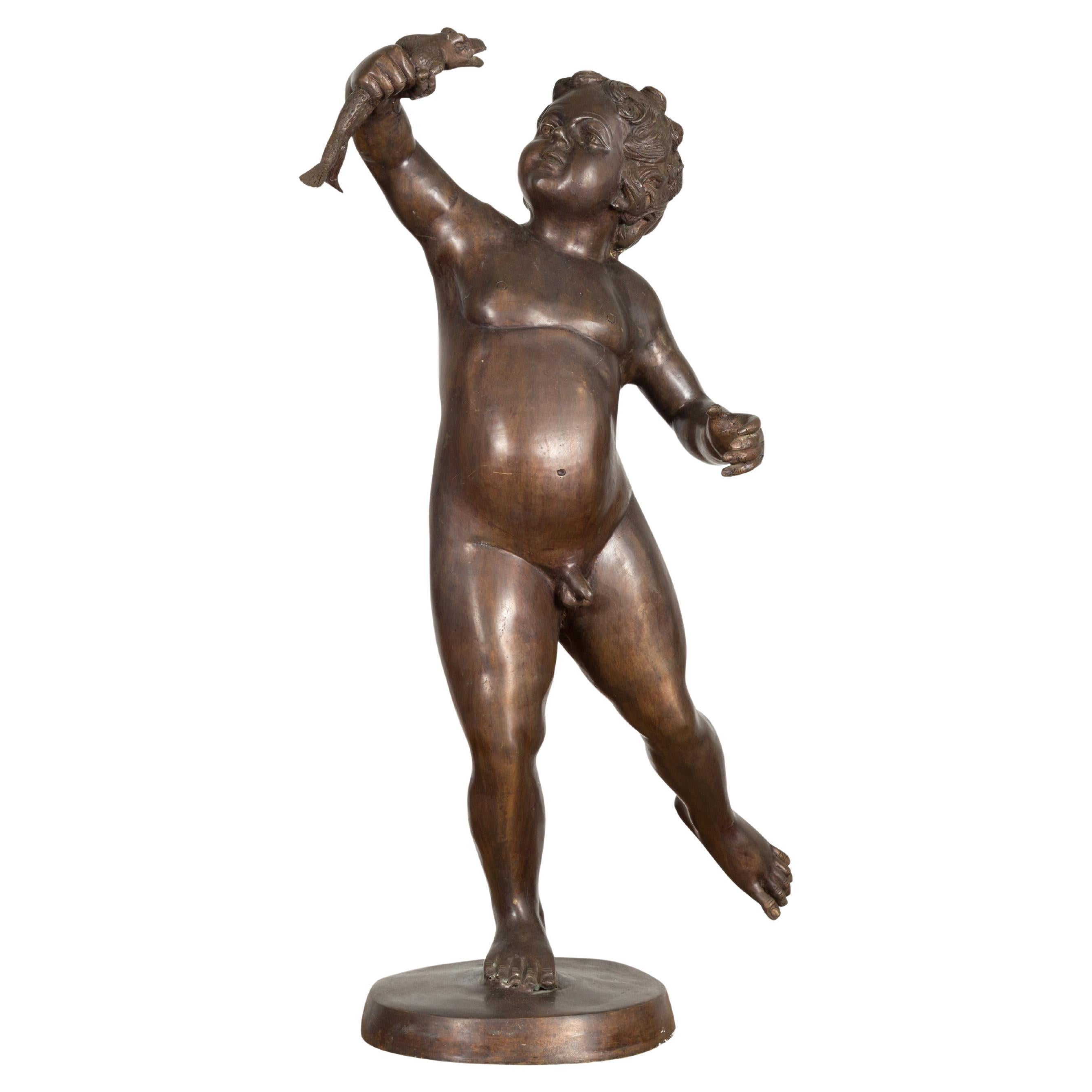Classical Bronze Tabletop Statue of a Putto Holding a Frog For Sale