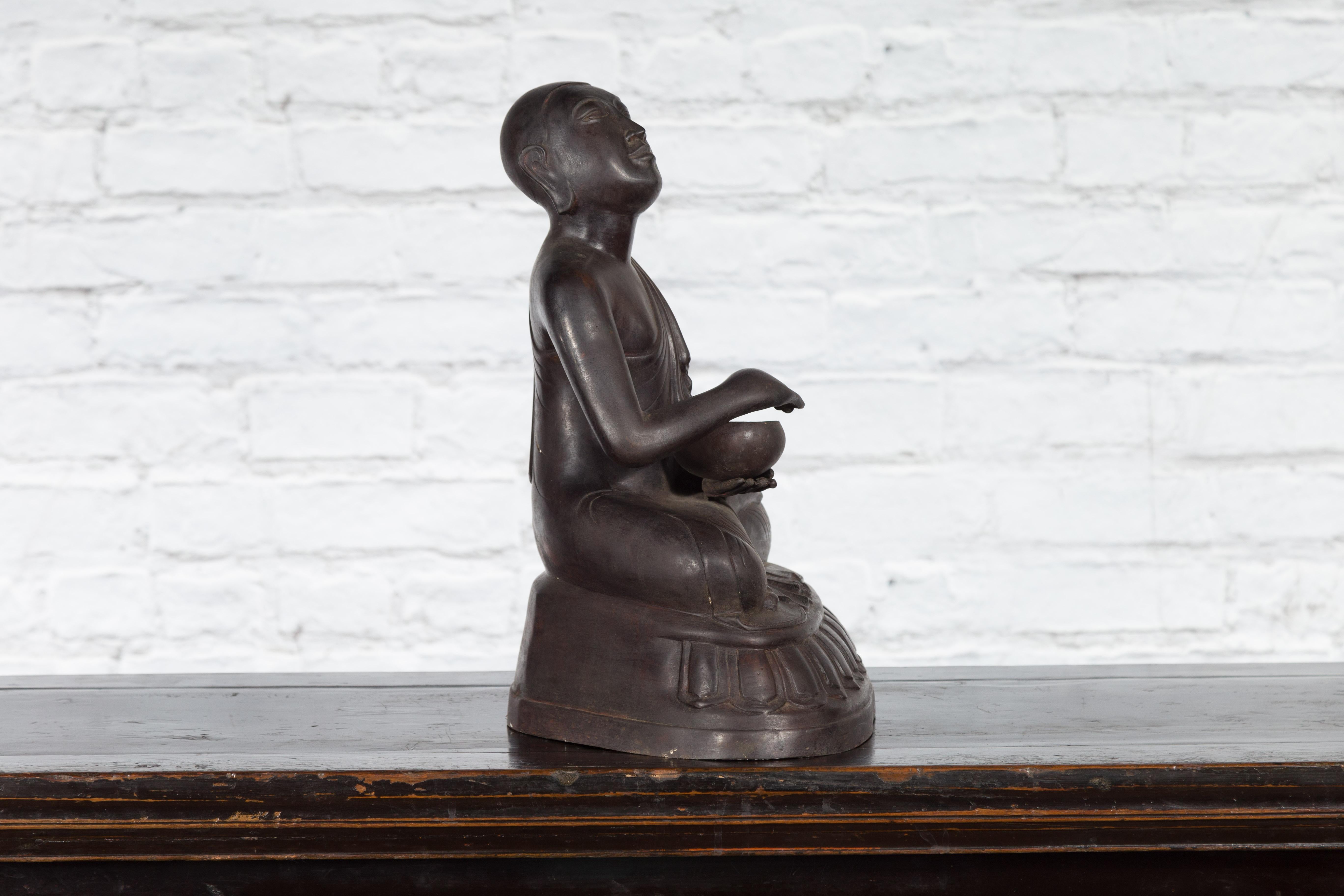 Bronze Lost Wax Sculpture Depicting a Praying Buddhist Monk with Offering Bowl For Sale 6
