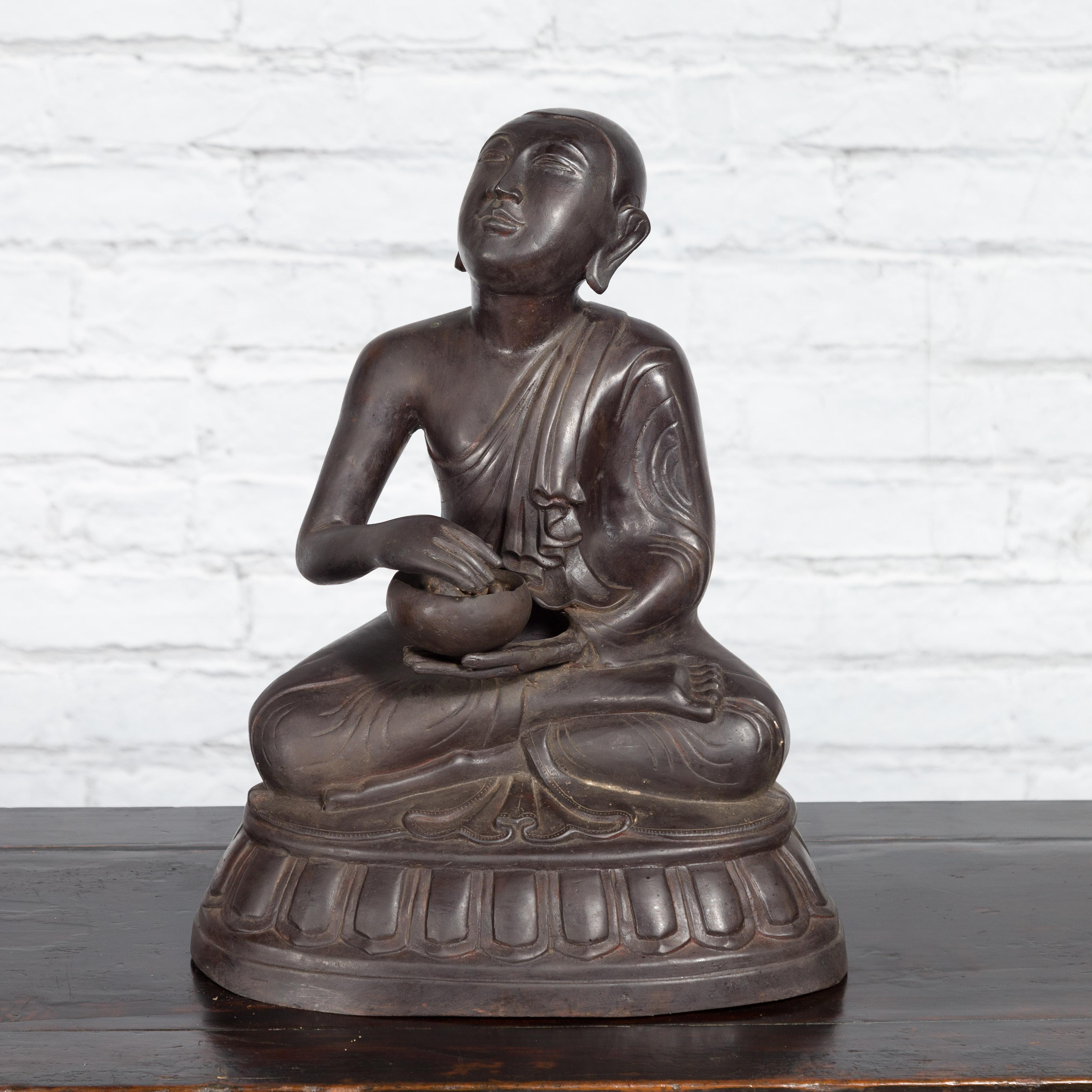Bronze Lost Wax Sculpture Depicting a Praying Buddhist Monk with Offering Bowl In Good Condition For Sale In Yonkers, NY