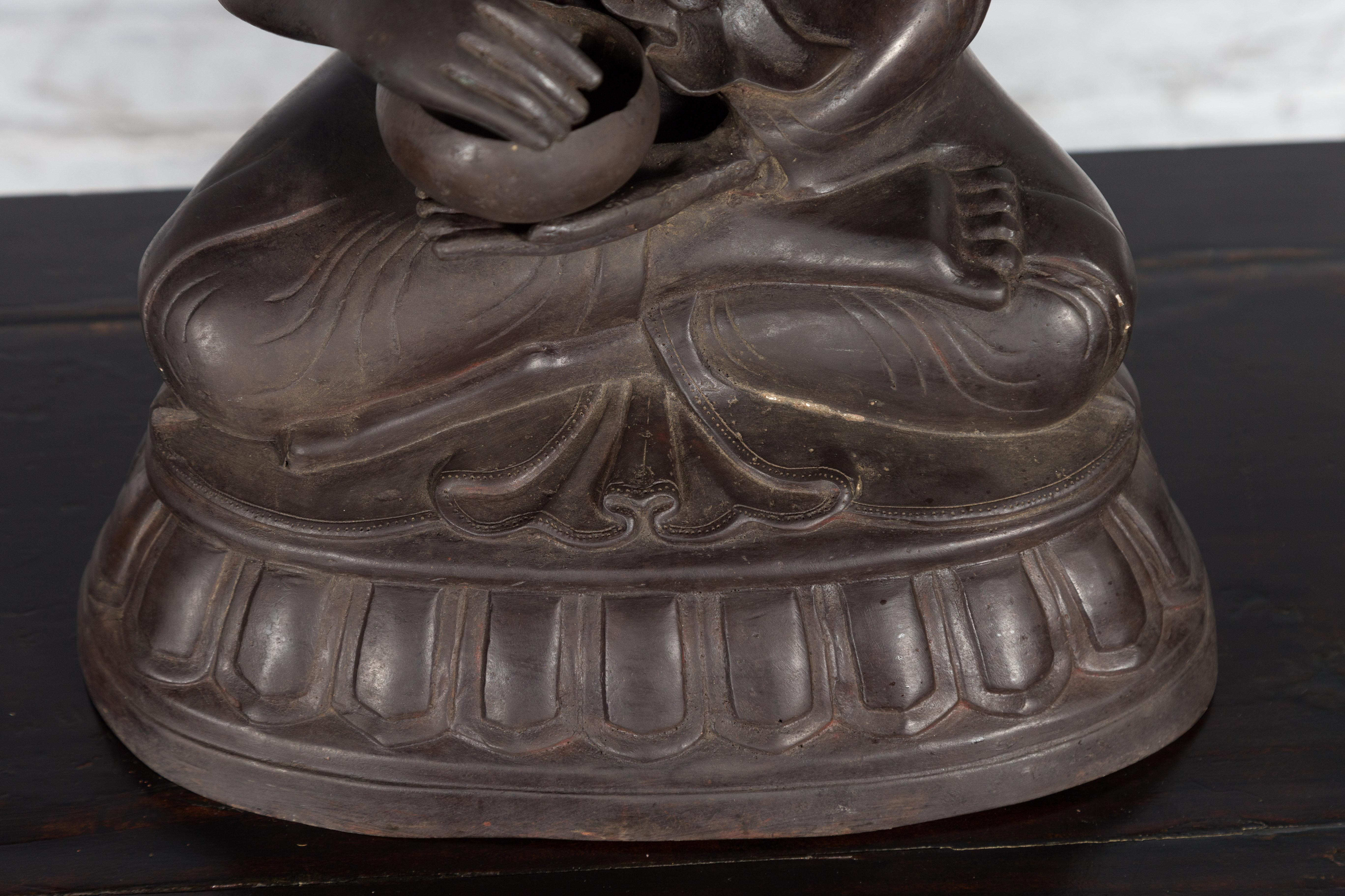 Bronze Lost Wax Sculpture Depicting a Praying Buddhist Monk with Offering Bowl For Sale 3