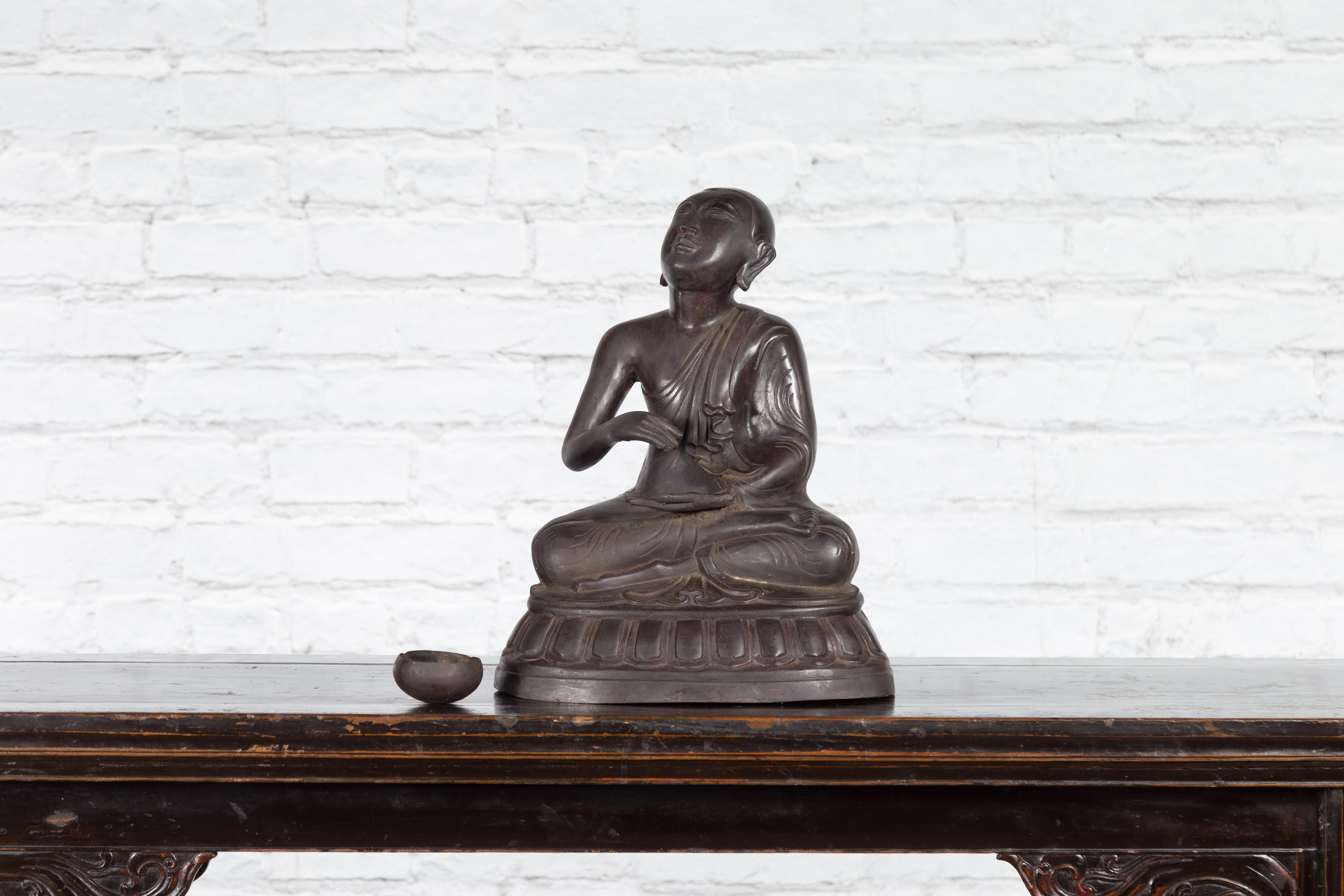 Bronze Lost Wax Sculpture Depicting a Praying Buddhist Monk with Offering Bowl For Sale 4