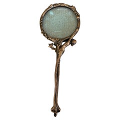 Lupa de bronce con desnudo Art Nouveau, ca. 1910