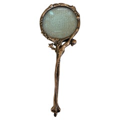 Verre grossissant en bronze avec nu Art Nouveau, vers 1910