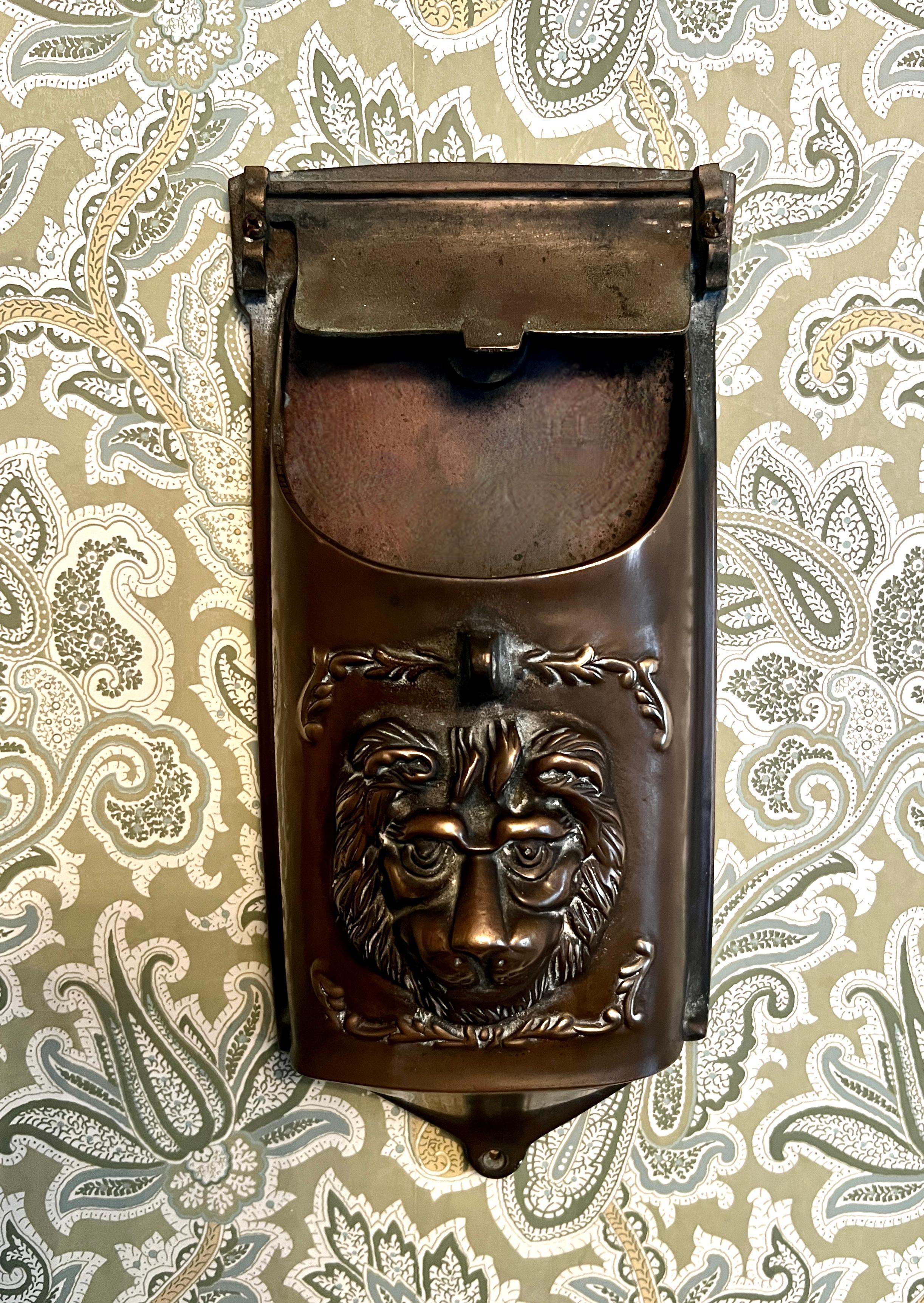 Vintage Bronze, heavy mailbox with lions face.  The piece is great for storing to-go menu's, place at the door for others to leave messages... the box is well made and The lion and detailing are very well done.

