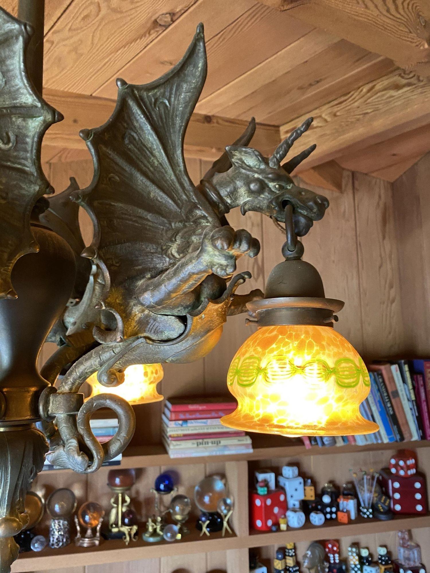 Bronze Medieval Dragon Chandelier w/ Quezal Gold Iridescent Shades In Excellent Condition For Sale In Van Nuys, CA