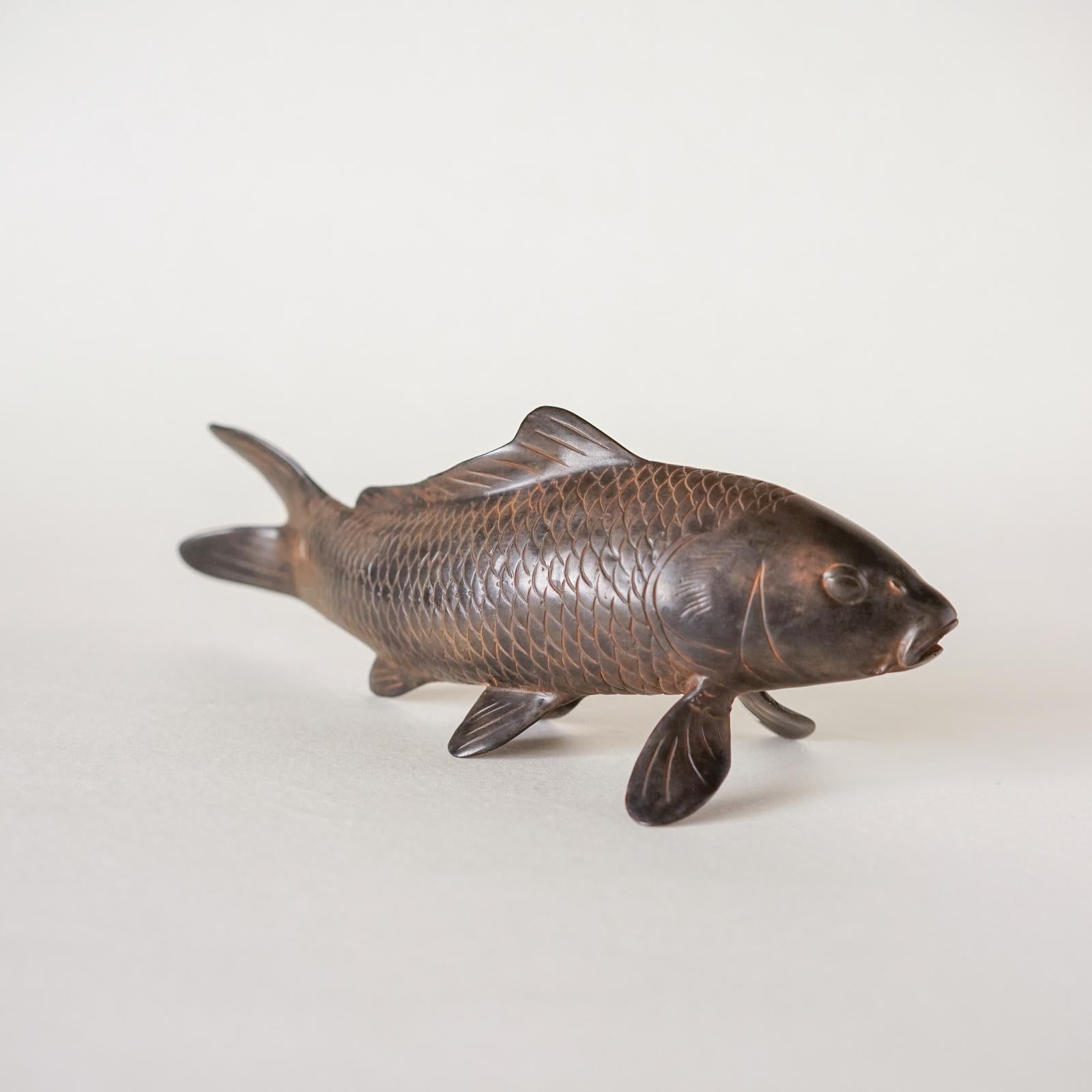 A Koi Fish are symbolic of perseverance and strength of purpose. This meticulously detailed carving of a small Koi fish is the perfect gift for a friend or relative who has those personal qualities. Modelled in wax and then cast in lost wax bronze,
